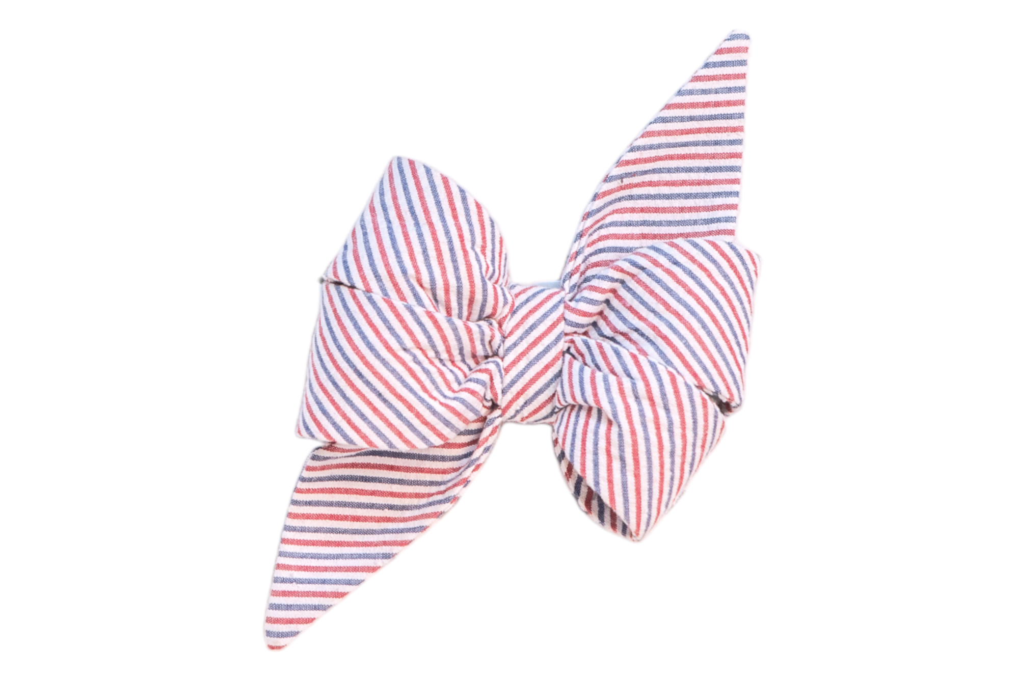 Patriotic-themed feminine dog belle bow with a red, white, and blue diagonal stripe pattern; crafted with structured loops and sharp, tapered tails, meant to be worn on a dog’s collar for a stylish touch.