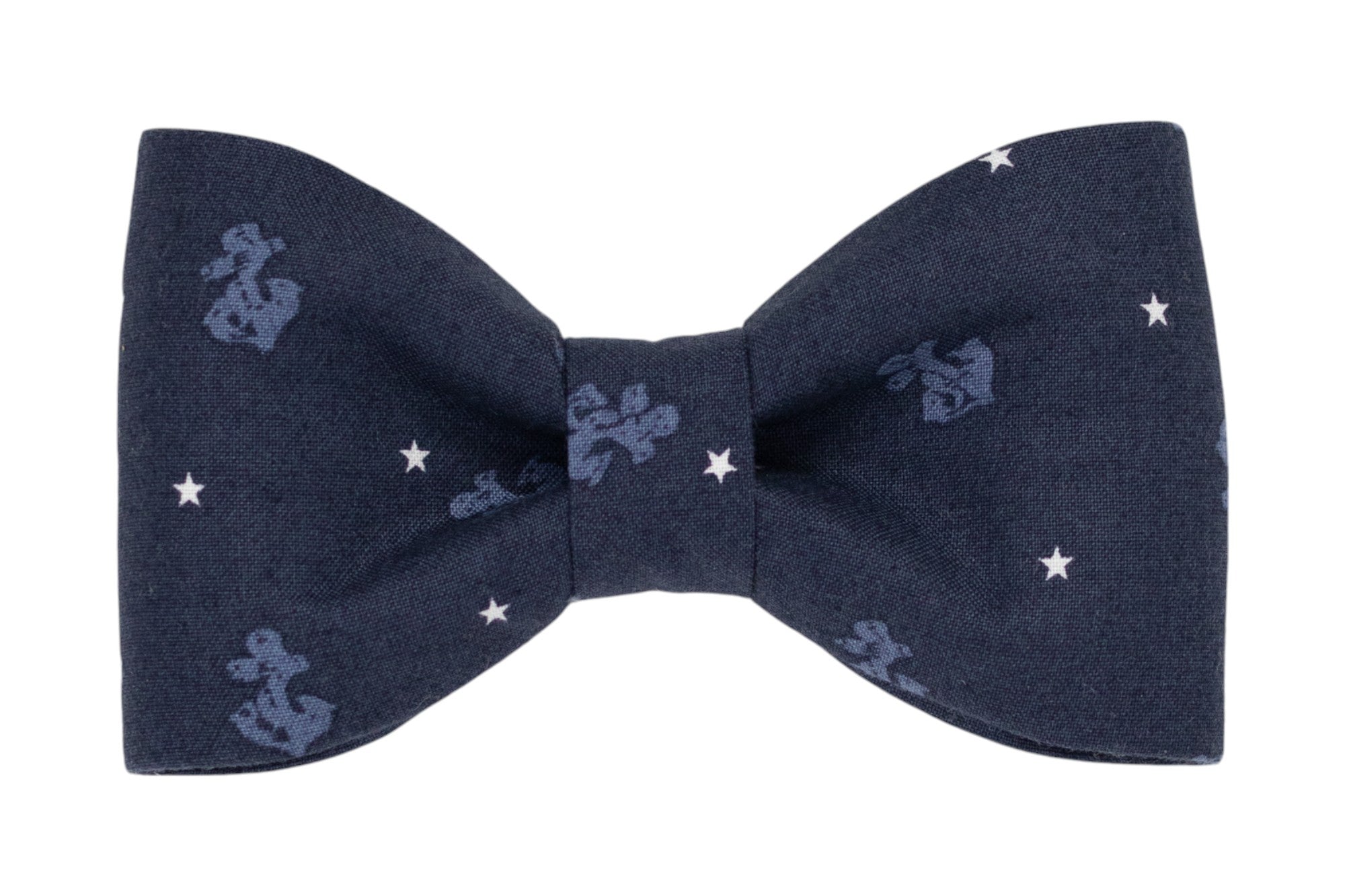 Navy blue dog bow tie decorated with light blue anchors and white stars. Perfect for pups who live on the coast or that have a nautical flair.