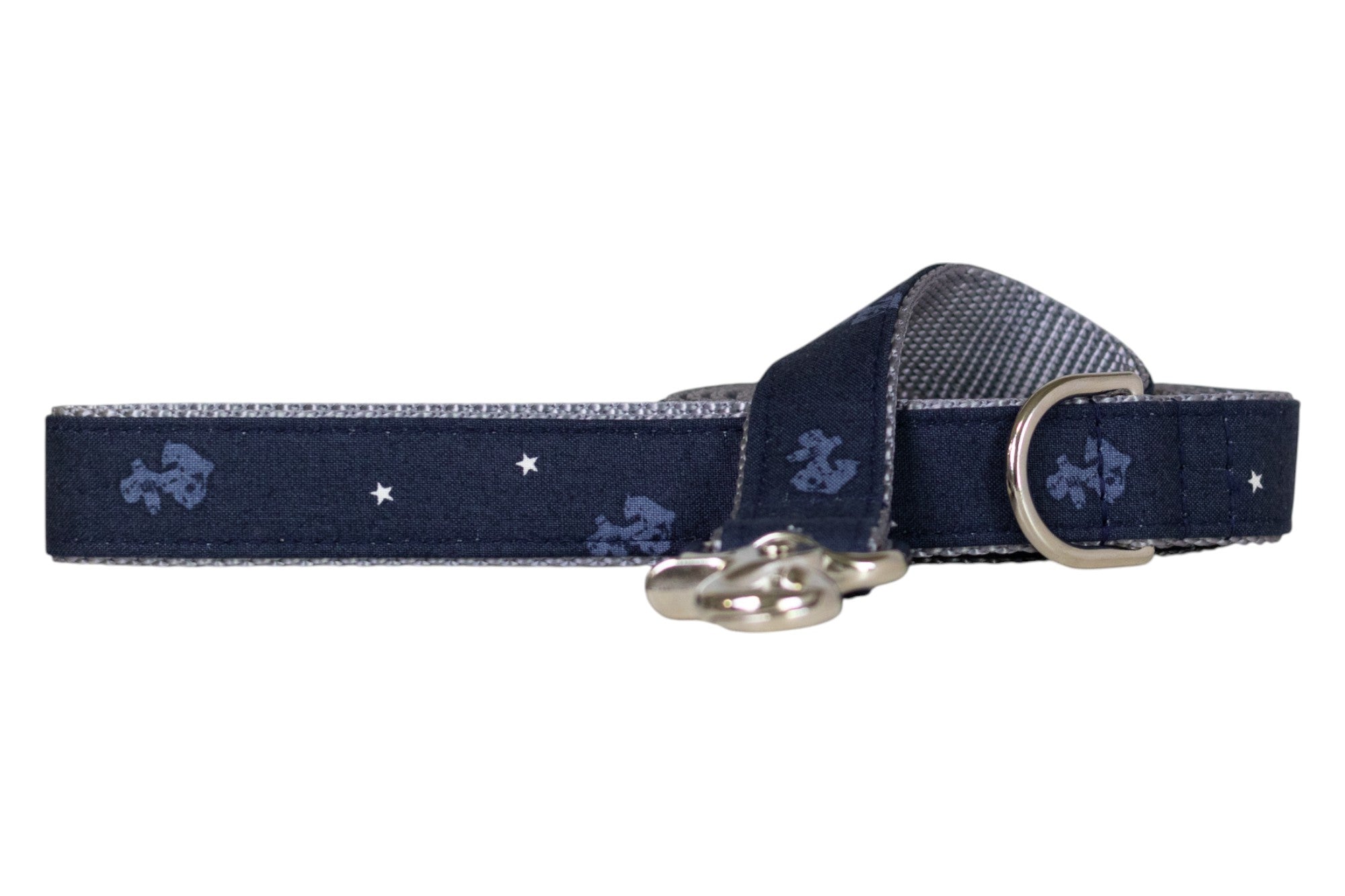 Navy blue dog leash with a nautical-themed pattern of light blue anchors and white stars, featuring silver-toned hardware, including a metal clasp and D-ring.