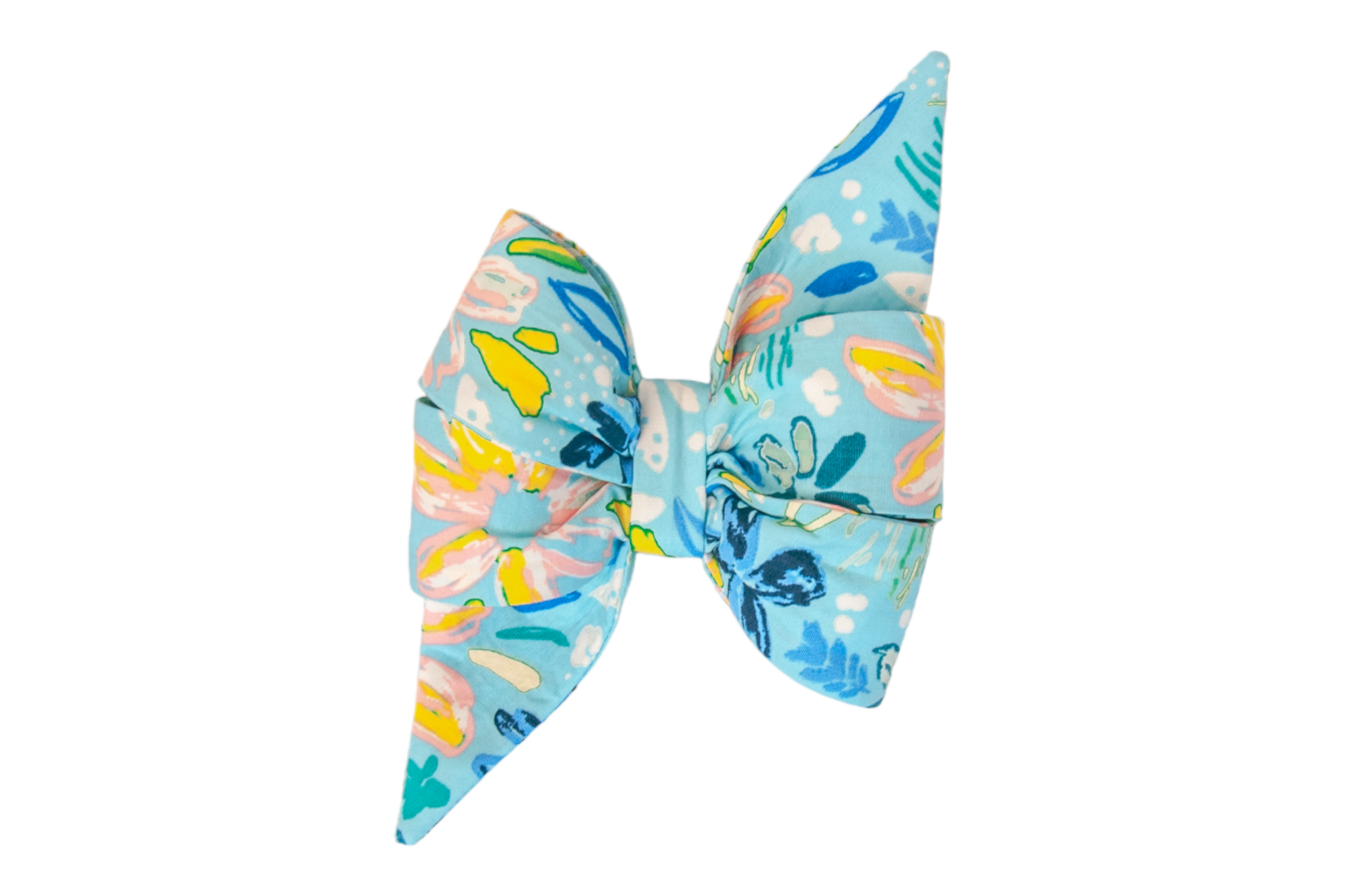 Bring a touch of coastal flair to your pet's Spring and Summer wardrobe with our Bayside Floral Girl Dog Belle Bow. This beautifully crafted accessory features a vibrant palette of pastel blues, yellows, greens, and pinks, arranged on a light blue base.