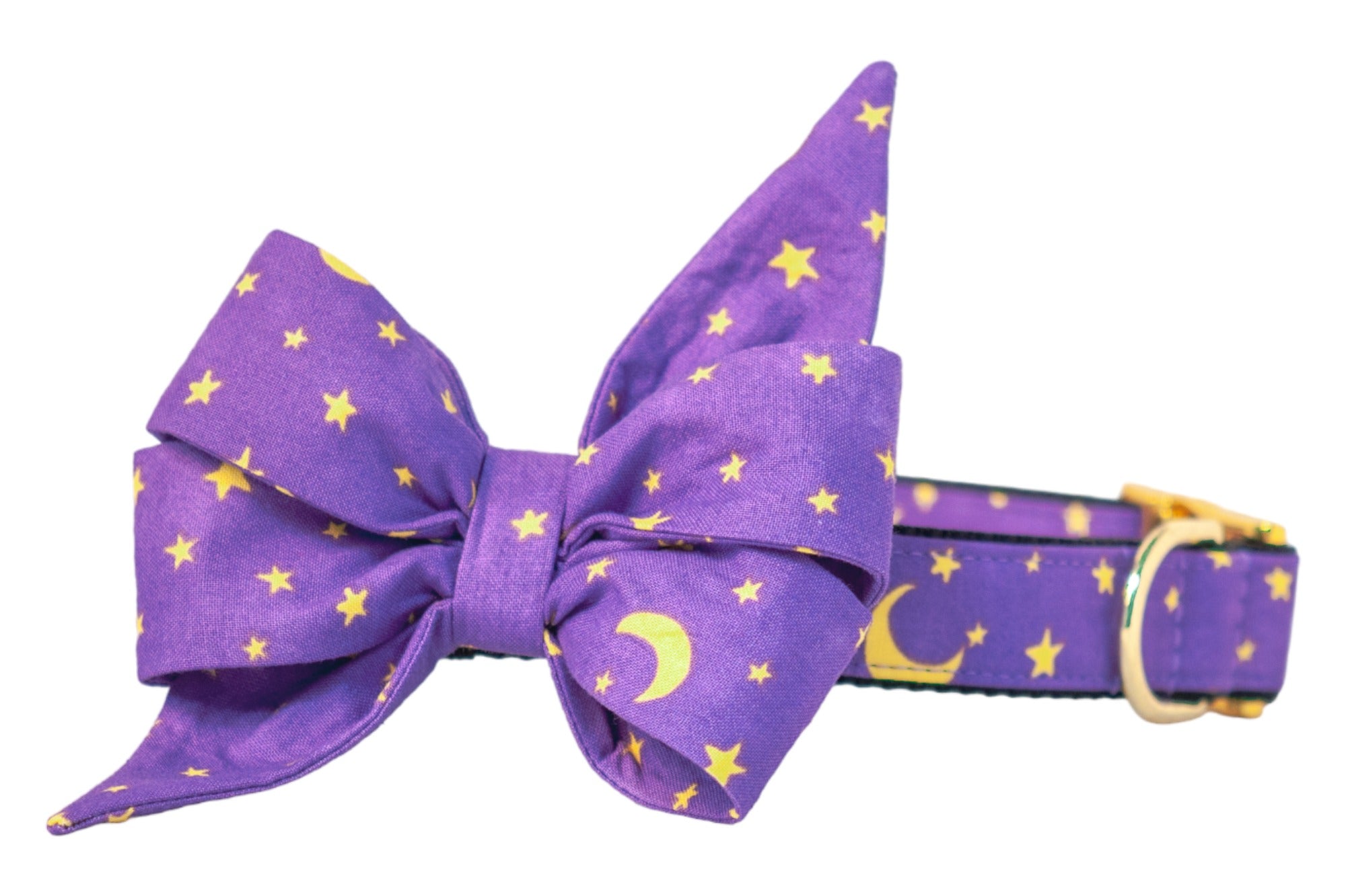 Purple dog collar with an oversized feminine belle bow, decorated with crescent moons and stars. The dramatic belle bow has structured loops and long pointed tails, making it an eye-catching choice for Halloween costumes, fall photoshoots, or dogs with cosmic style. Polished hardware adds a touch of elegance.