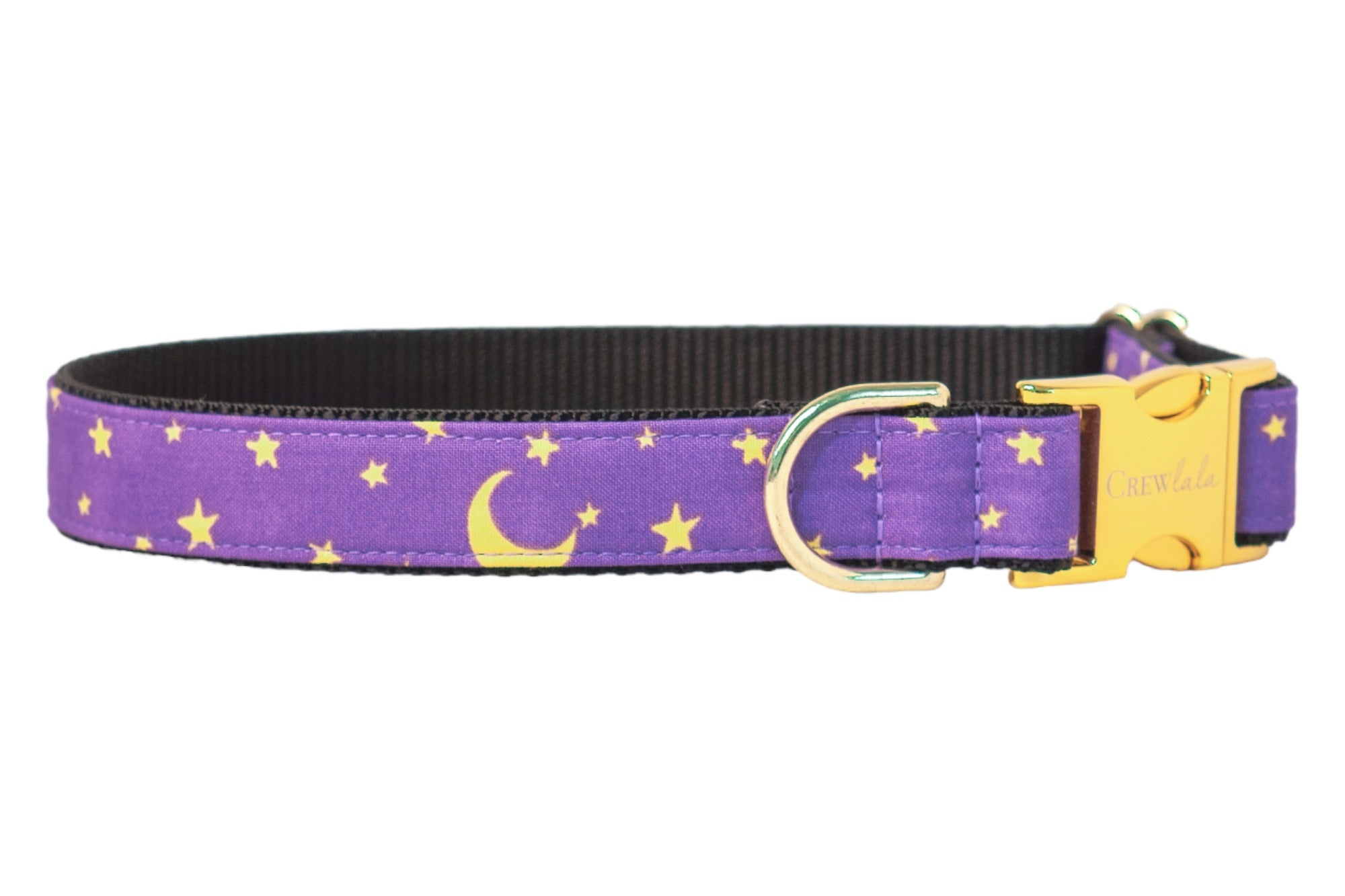 Purple dog collar with a night sky design featuring bright stars and crescent moons, paired with polished hardware and a sleek nylon webbing lining. This dreamy, magical accessory is perfect for dogs celebrating Halloween or just looking stylish under the moonlight.