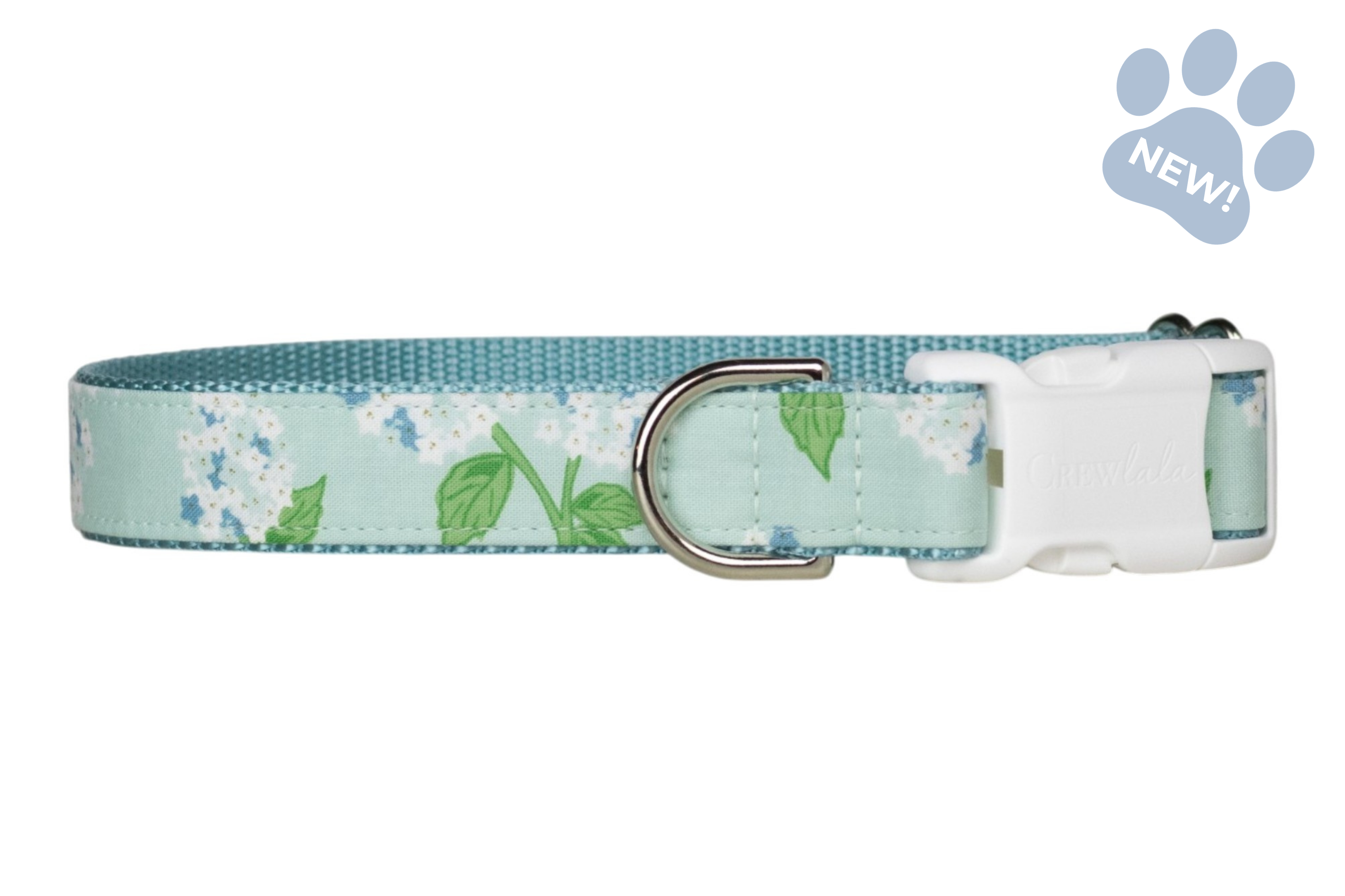 Adjustable dog collar featuring a soft mint blue background with white hydrangea blooms, blue floral accents, and green leaves, finished with silver-tone hardware, matching blue webbing and a sturdy white plastic buckle.