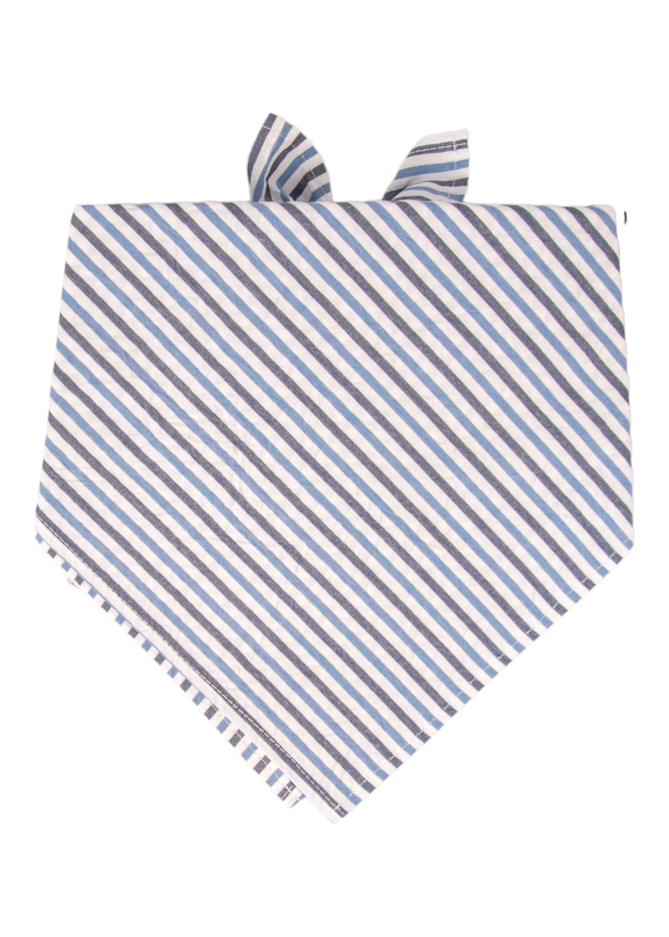A dog bandana with a navy, blue, and white diagonal stripe pattern. The bandana is tied at the top with visible fabric ends, and the pointed bottom gives it a classic look. Made of lightweight seersucker fabric, the design combines a crisp, nautical style with a modern, preppy aesthetic.