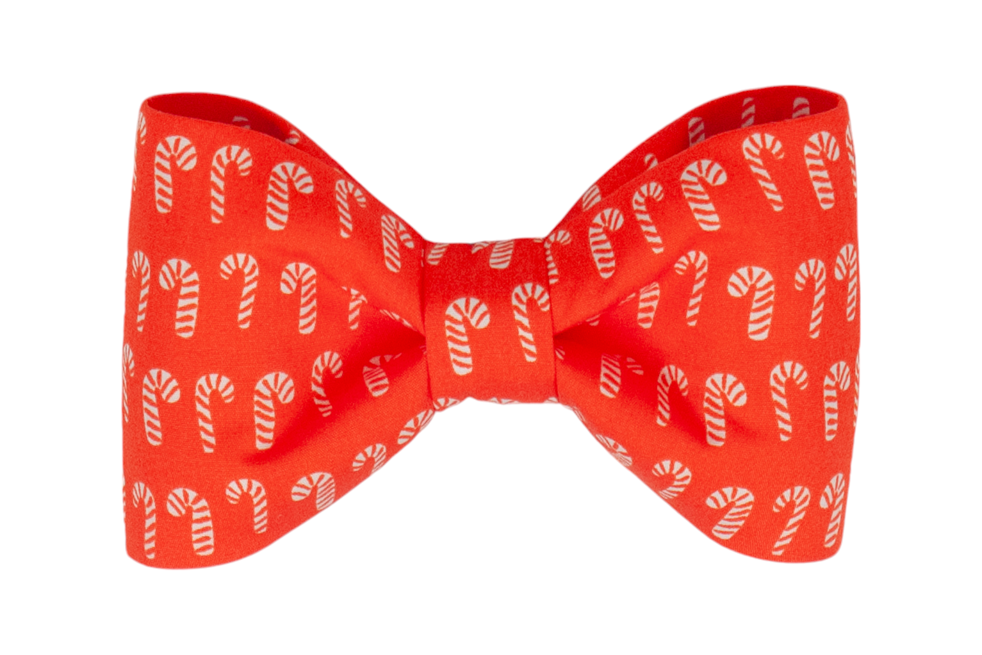 A festive dog bow tie made from bright red fabric with a repeating pattern of small candy canes. The bow tie features a classic symmetrical shape with a gathered center, adding a playful and cheerful holiday accent to your pup's collar.