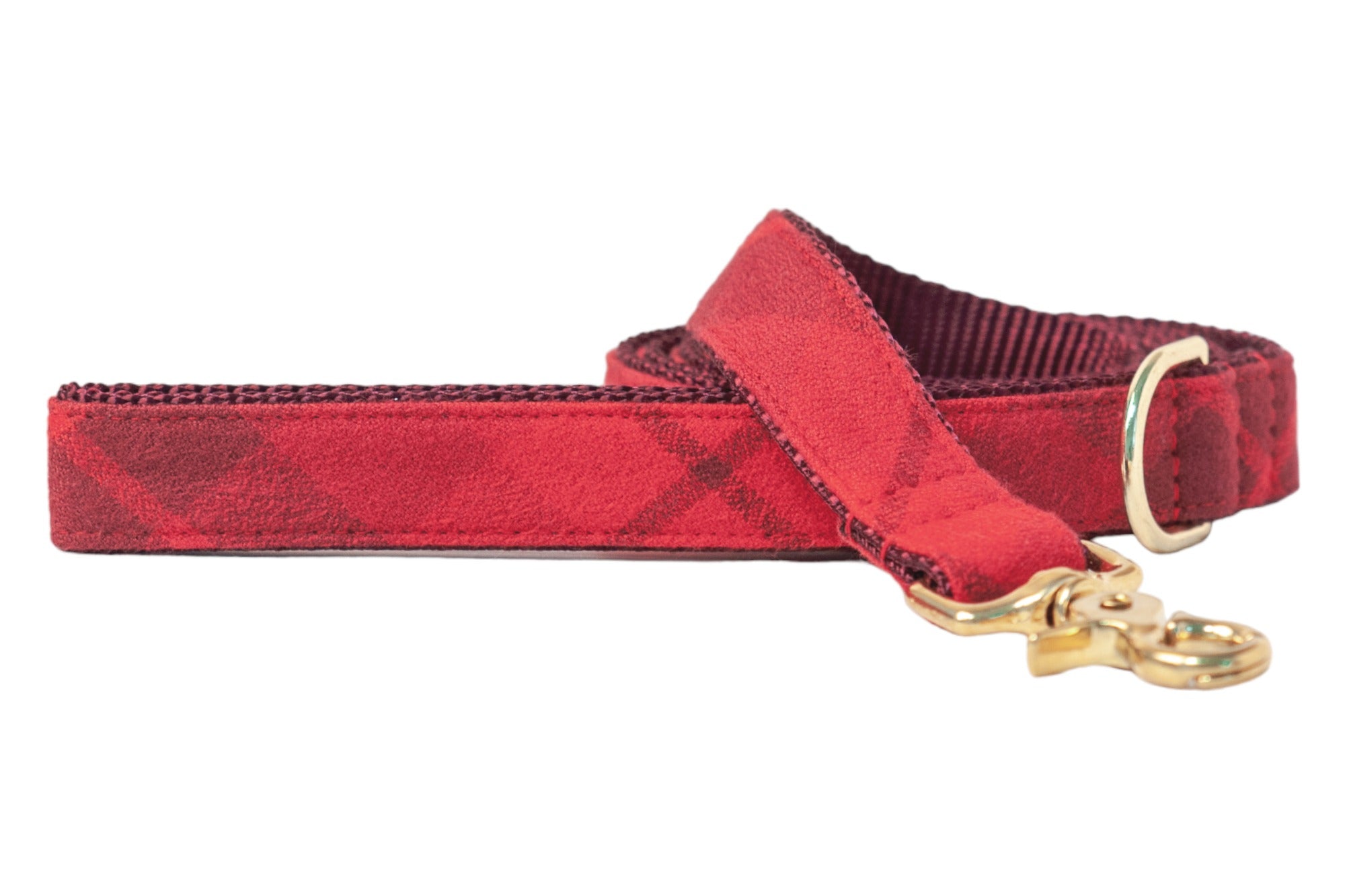 Elevate your dog's daily walks with this premium red leash, featuring a cozy flannel fabric, subtle plaid design, and polished hardware for a luxe finishing touch.