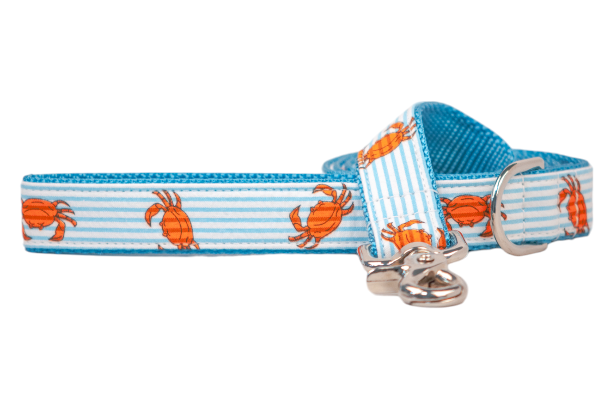 Dog leash with a coastal-inspired design featuring bright orange crabs printed over light blue and white horizontal stripes. The leash has durable blue webbing on the underside, reinforced stitching, and silver hardware including a swivel snap hook and D-ring.