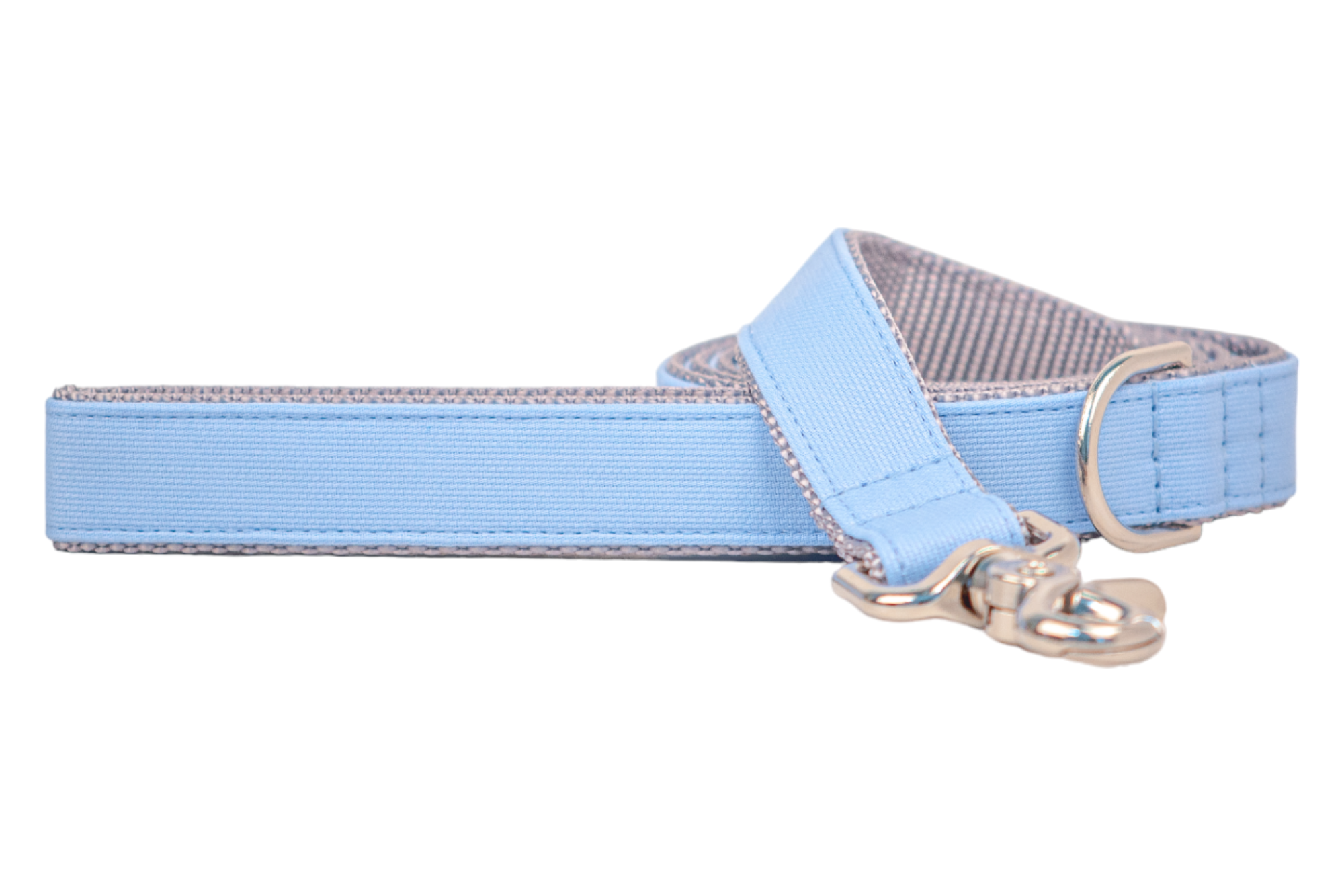 Modern and minimal light blue dog leash with a sturdy silver clip, soft gray lining, and reinforced design for stylish everyday walks.
