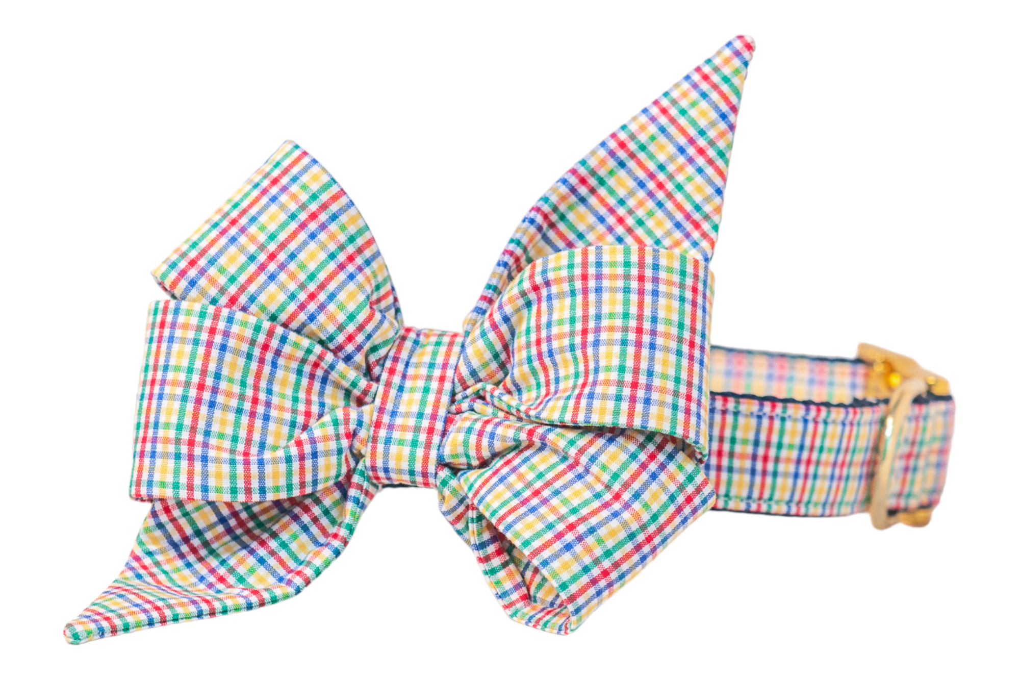 Bright, using primary colors, plaid dog collar with matching oversized belle bow attached. The feminine belle bow has angular shaping with pointed ends and layered folds, while the collar is fitted with a shiny buckle and precise stitching along the edges. Perfect for fall and back to school!