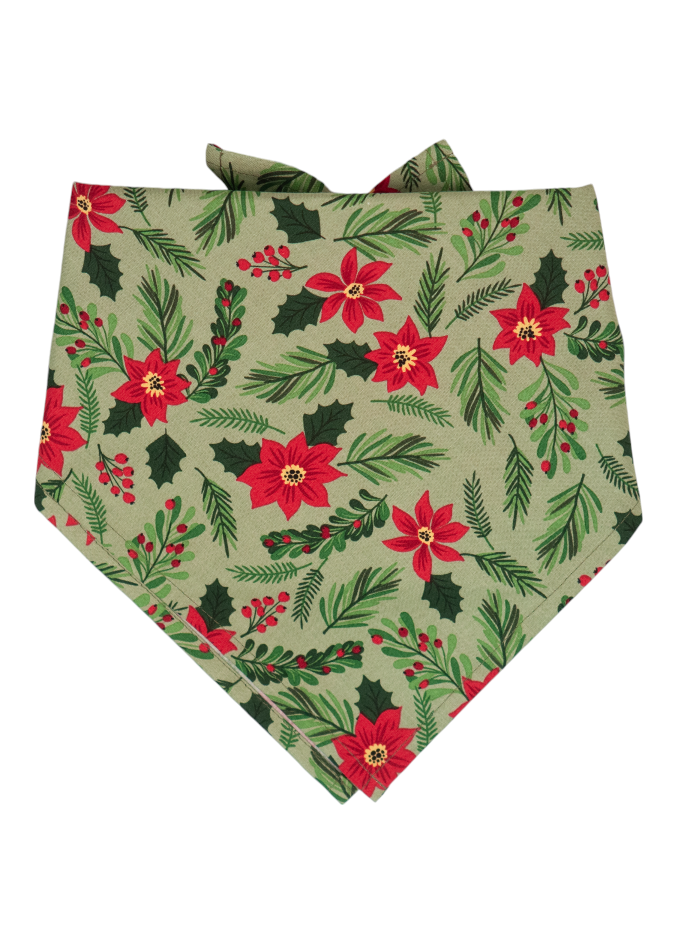 A holiday-themed dog bandana folded in a classic triangle shape, made of light green fabric with poinsettias, green pine branches, holly leaves, and berries. The bandana has a folded top edge for easy tie-on wear and features a dense, repeating pattern ideal for festive styling.