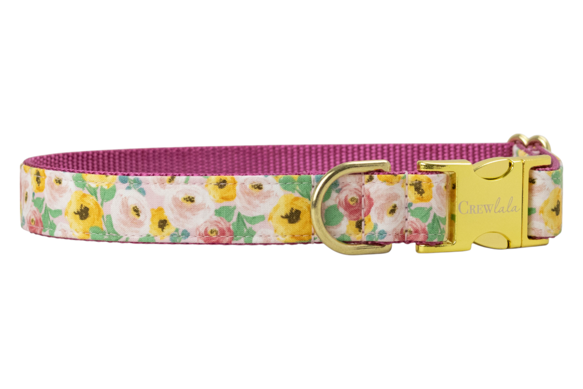 Floral dog collar with a soft pink flower design. The collar has a nylon webbing interior, a D-ring, and a matching buckle engraved with the brand name “CrewLala.”