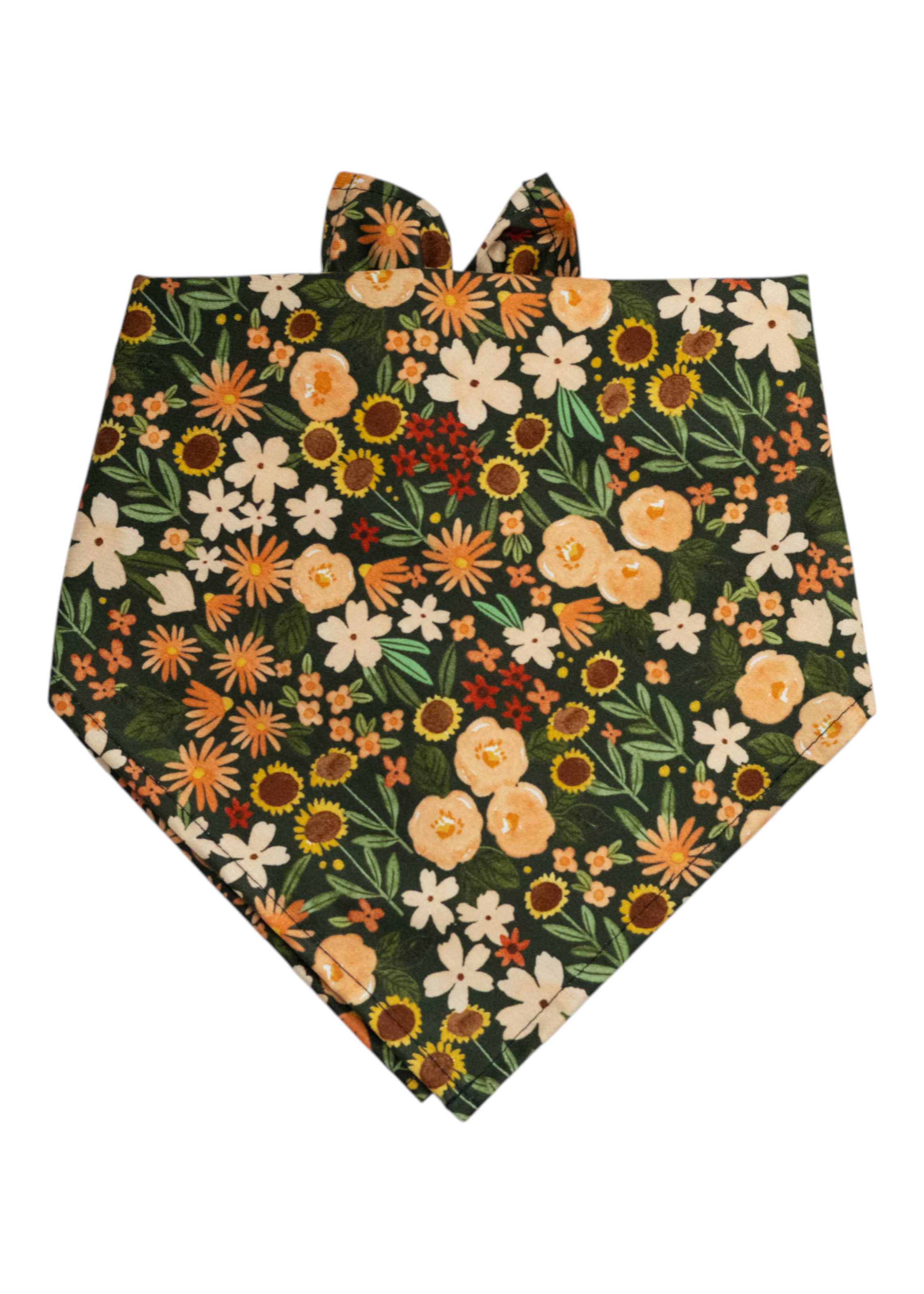 Floral dog bandana with a mix of warm toned flowers on a dark green backdrop, arranged in a vibrant, garden-inspired design.