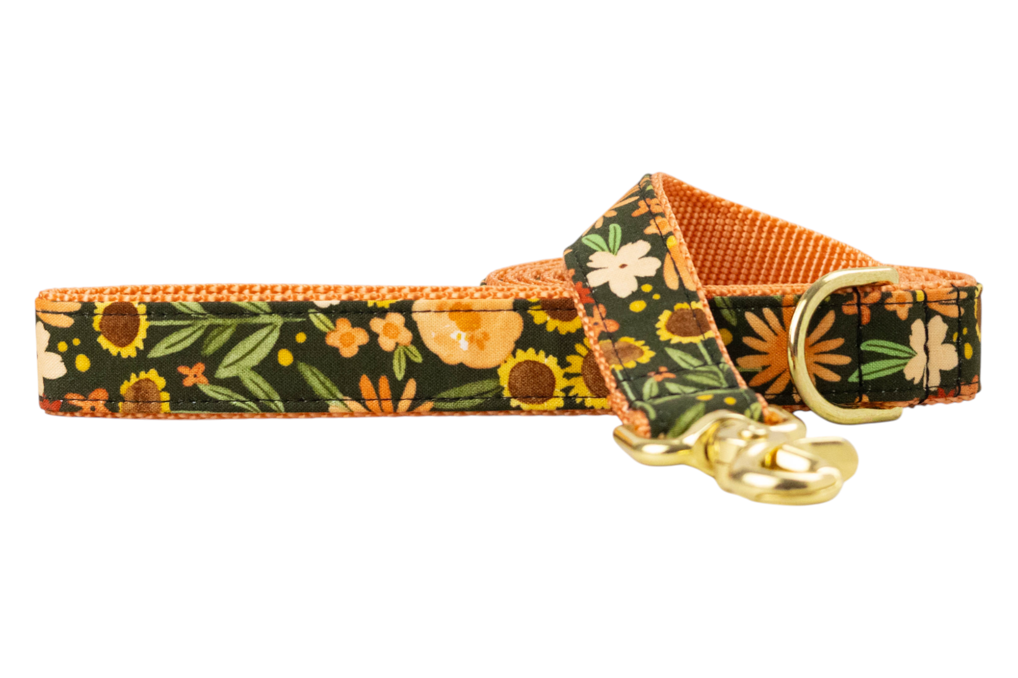Floral dog leash in earthy tones, decorated with sunflowers, daisies, and foliage, and fitted with metal hardware.