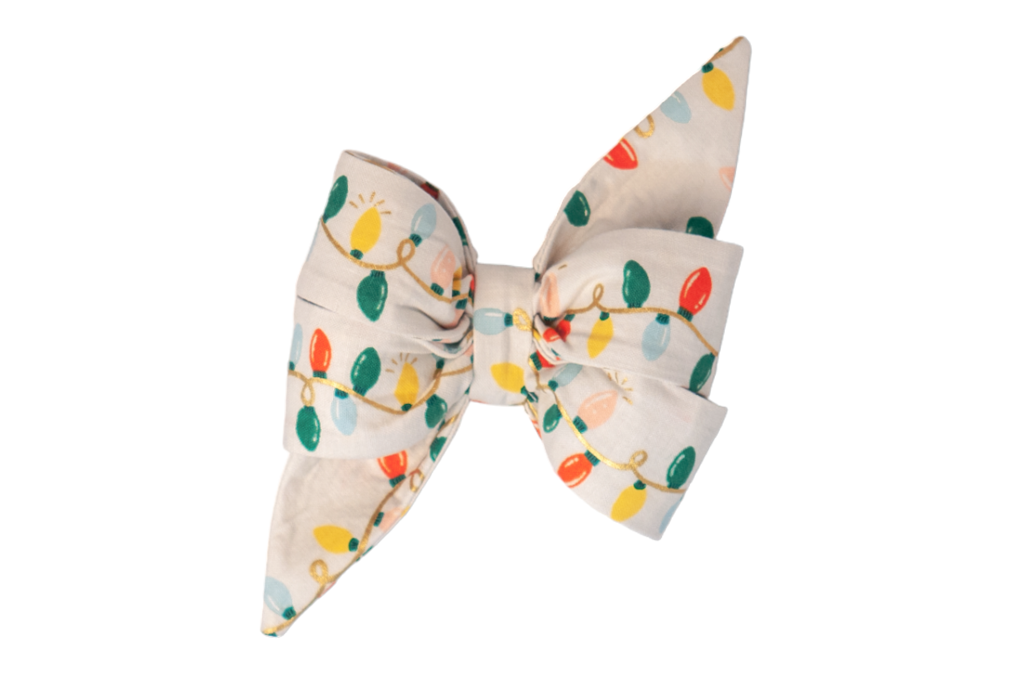 A whimsical, feminine dog belle bow featuring a festive string light print on a cream background. The bow’s sharp, tapered ends and structured layers are adorned with illustrations of colorful holiday bulbs connected by swirling lines, giving it a bright and cheerful appearance.