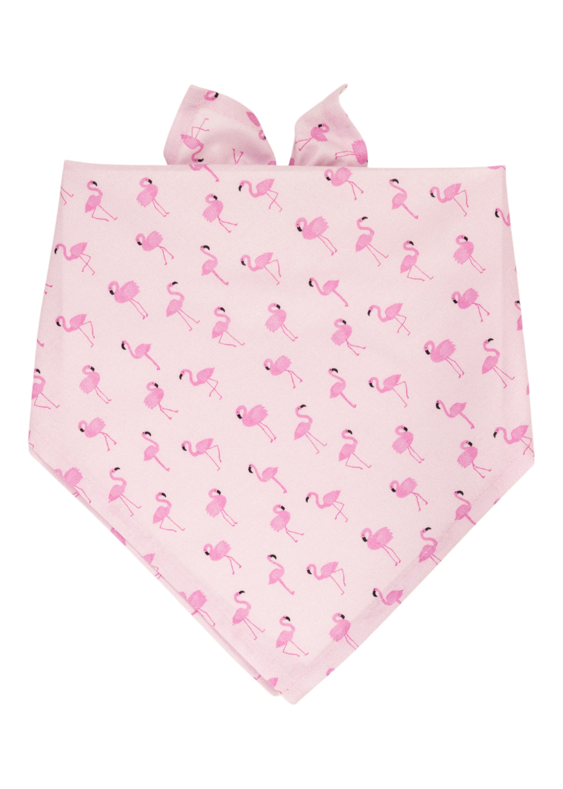 Flamingo-themed dog bandana in pastel pink, decorated with numerous pink flamingos standing and walking. The fabric is neatly folded with tie ends for easy wear.