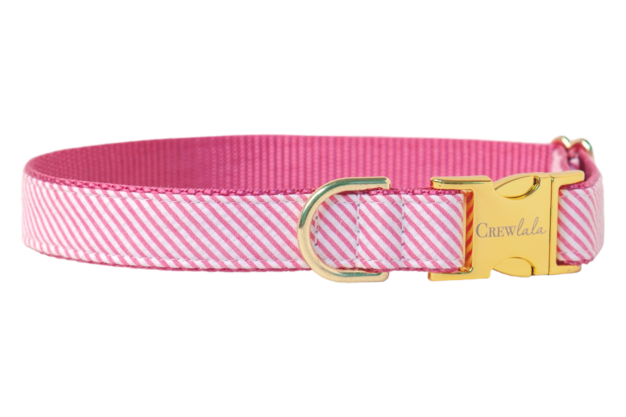A chic seersucker dog collar featuring diagonal fuchsia and white stripes, backed with durable pink nylon webbing. It’s finished with shiny gold-tone hardware, including a D-ring for leash attachment and a metallic side-release buckle engraved with “Crewlala”—perfect for pups who like their fashion as polished as their personality.