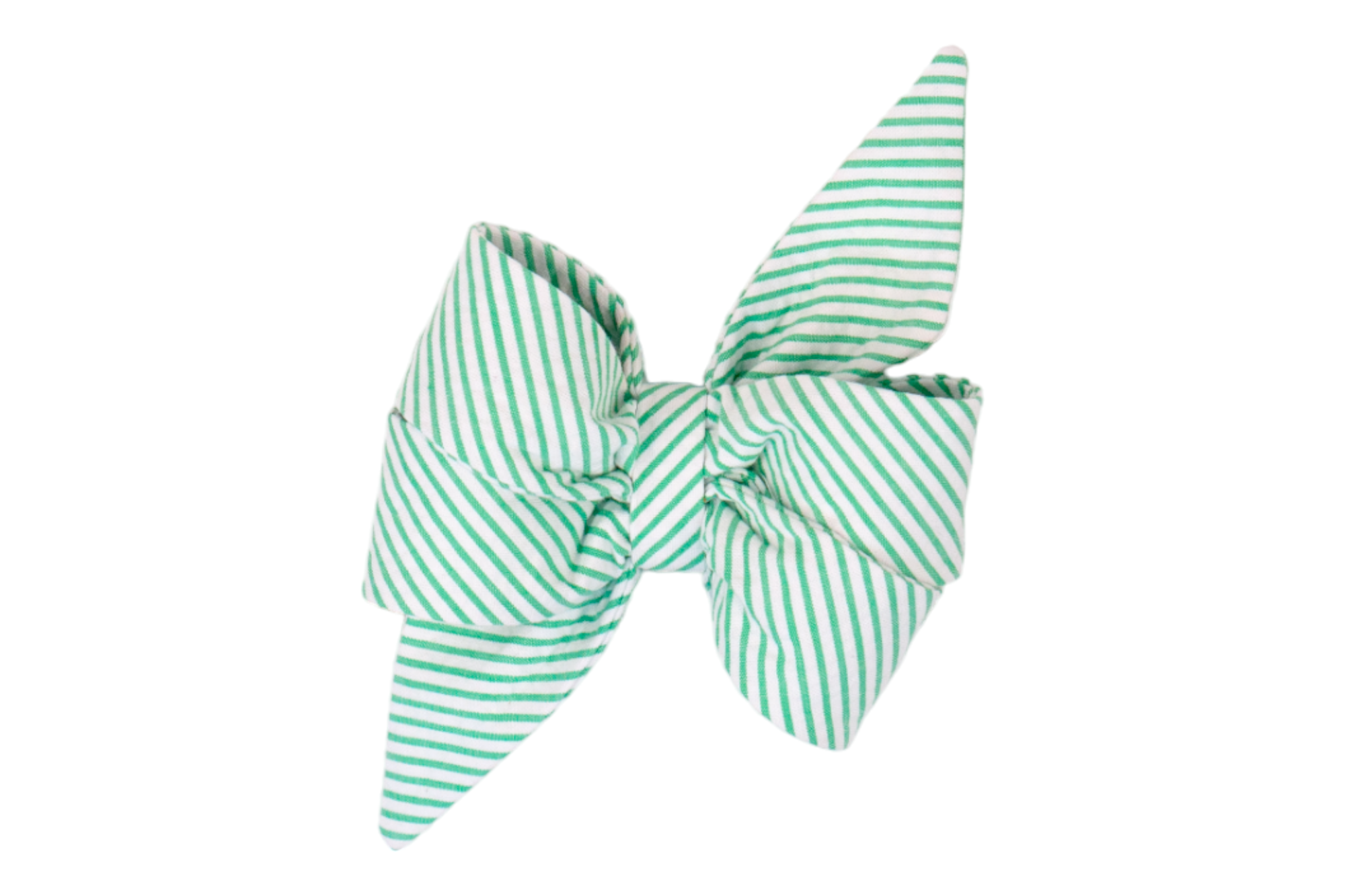 A large, structured girl dog belle bow made from green and white striped seersucker fabric, with prominent puffed loops and long pointed tails. The bow has a crisp, symmetrical shape and features the fabric’s characteristic puckered texture and diagonal striping.