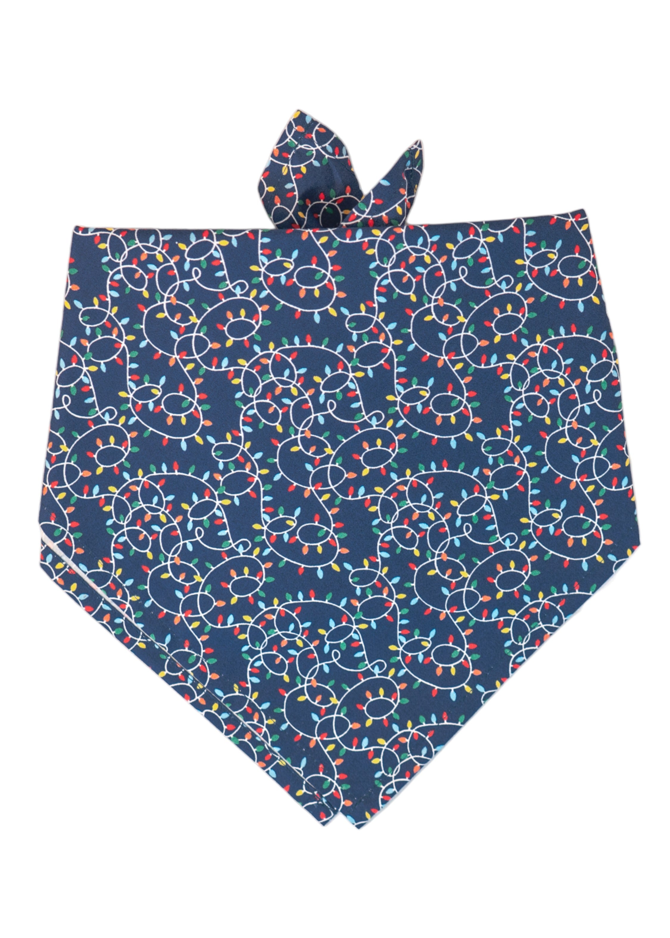 Holiday dog bandana in dark navy fabric decorated with bright string lights in festive colors. The swirling cords weave across the fabric in a tangled, fun design. Folded in a triangular shape with simple tie ends for a secure and adjustable fit.