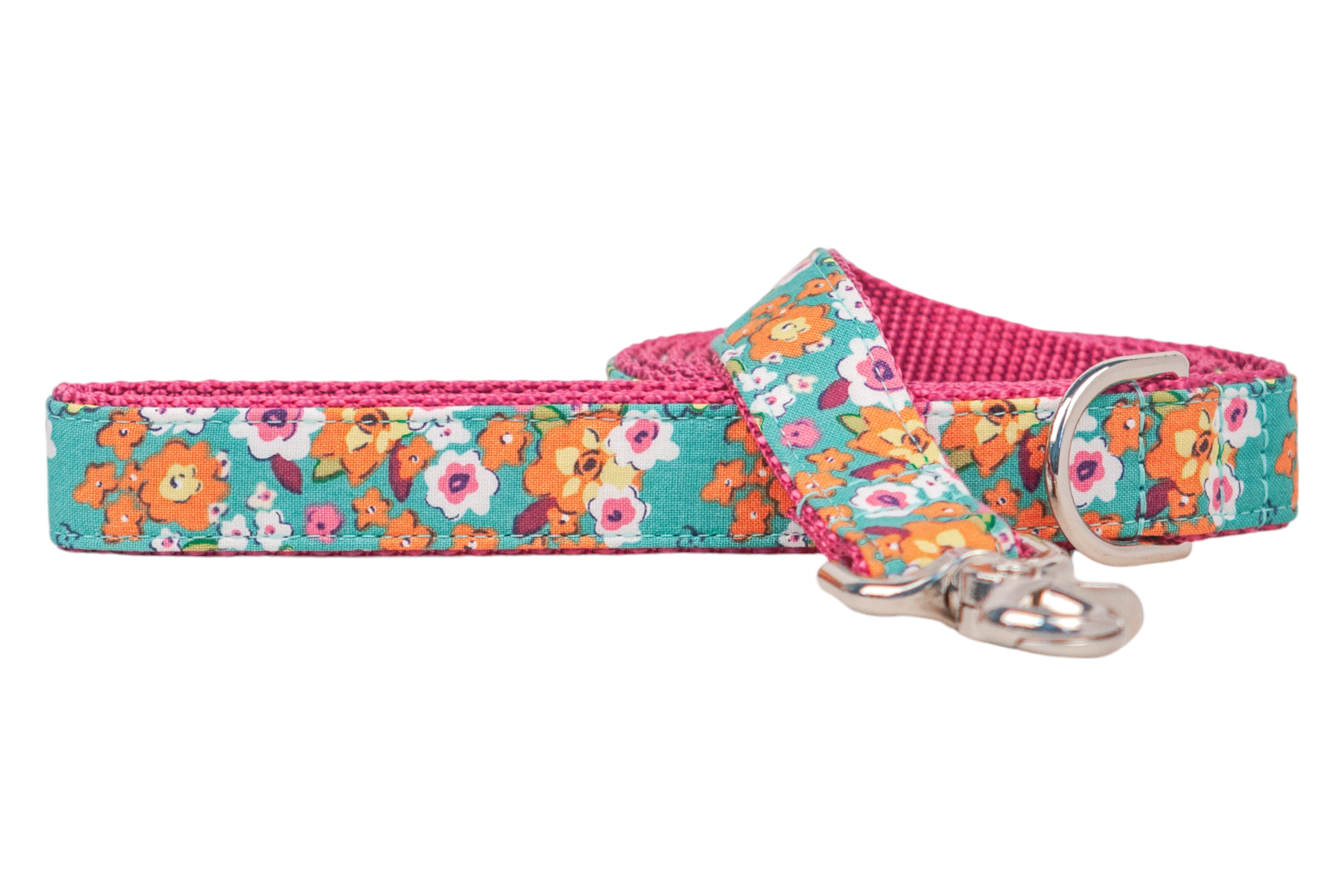 A playful dog leash featuring a retro-style floral print over a turquoise green base. The inner side is reinforced with textured nylon, and the leash includes polished hardware for secure attachment.