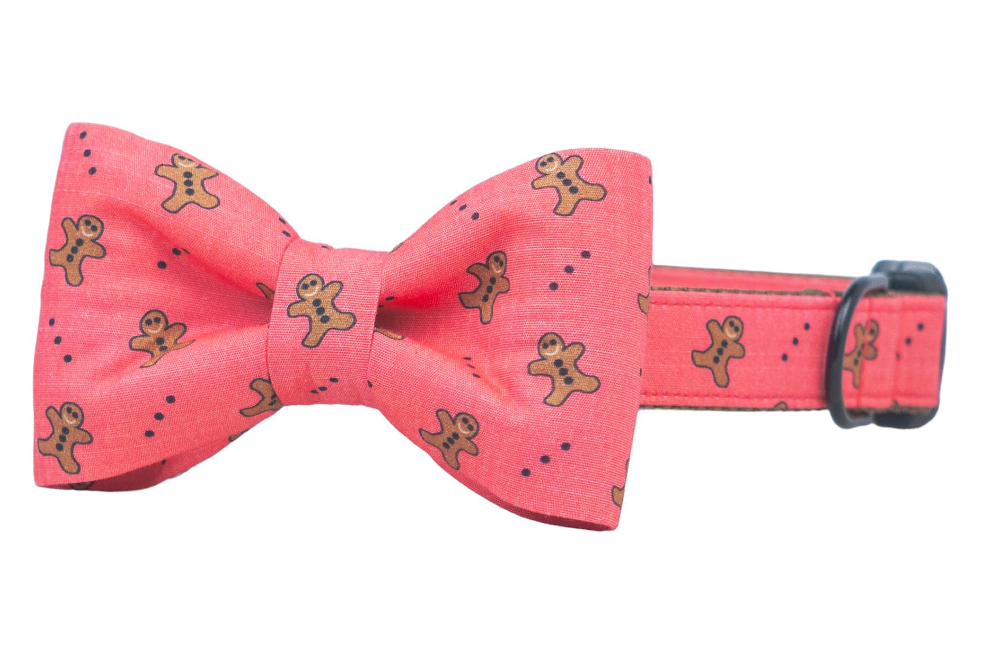 This festive dog collar with an attached and matching bow tie is a cookie-lover’s dream, boasting a gingerbread man print on vibrant red fabric and finished with sturdy hardware. Perfect for pups who like to sleigh the style game!