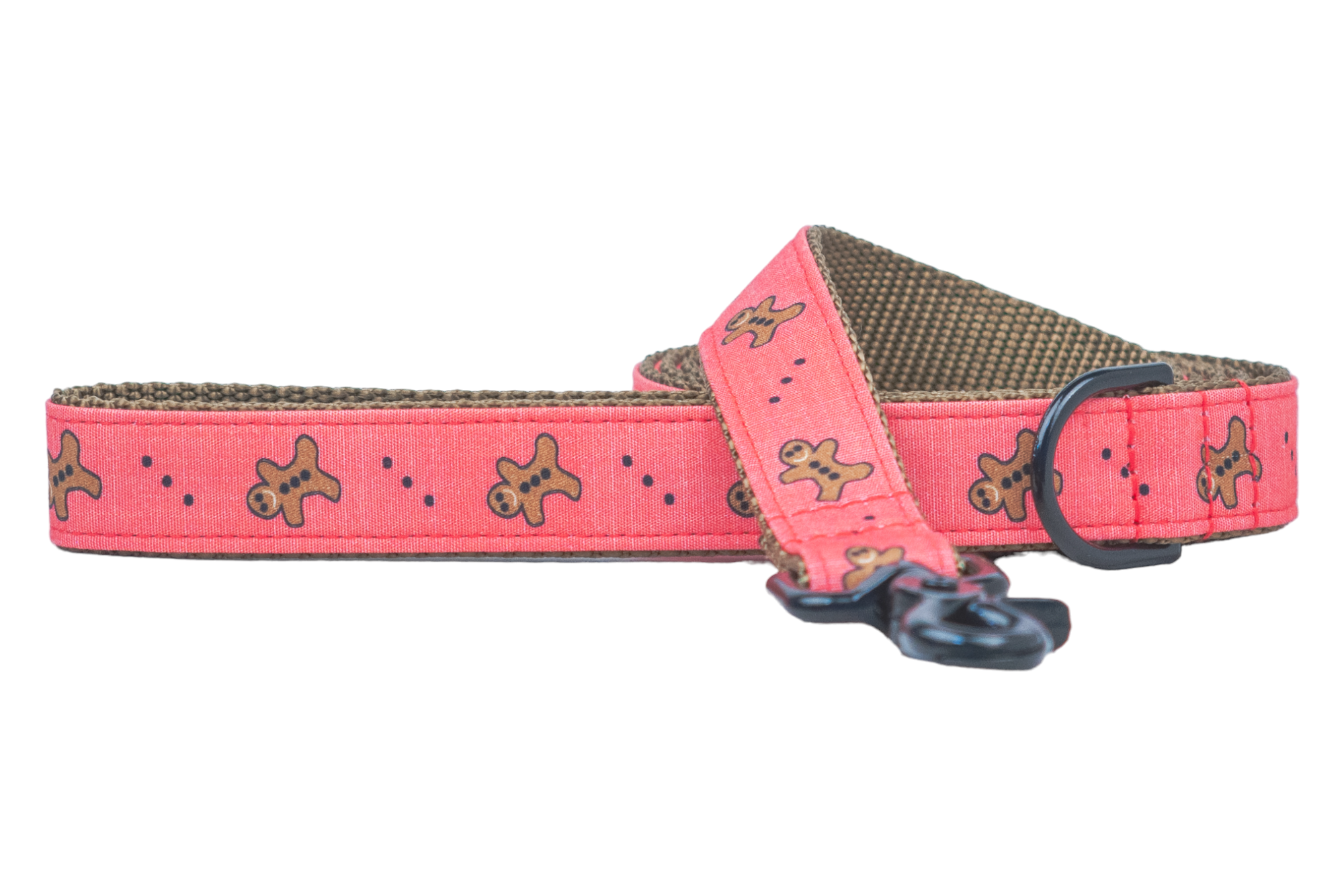 Jingle all the way with this adorable gingerbread-themed dog leash! With a vibrant red band sprinkled with gingerbread men and playful dots, plus a comfy nylon lining and tough clip, your pup’s look will be the talk of the dog park.