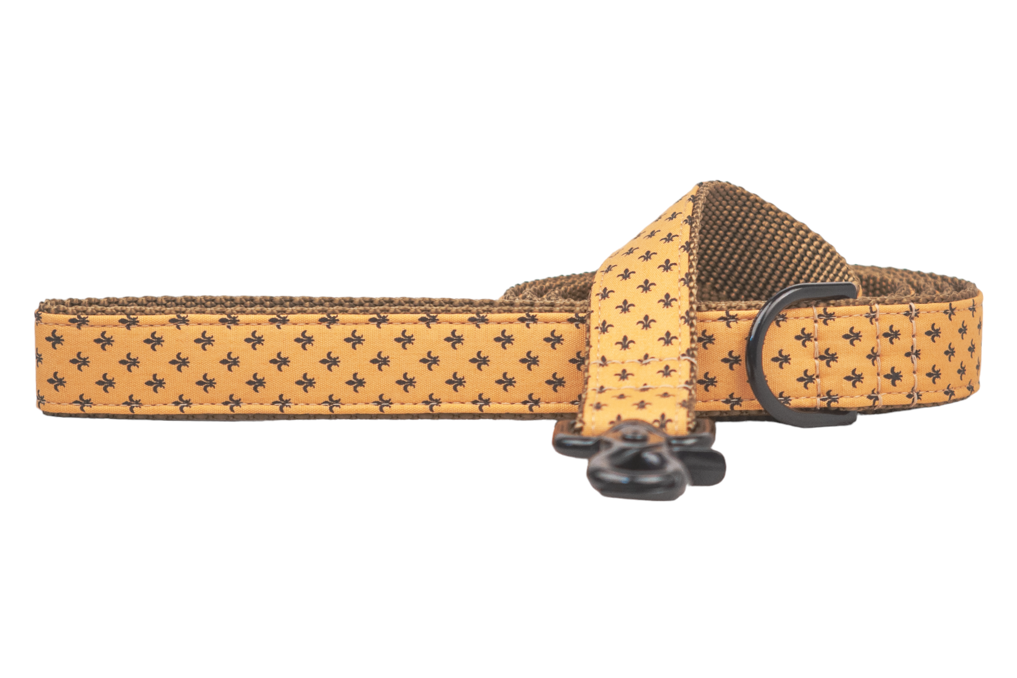 Stylish dog leash featuring a golden-yellow fabric patterned with tiny black fleur-de-lis symbols, backed with sturdy nylon webbing, and equipped with metal fittings for secure attachment.