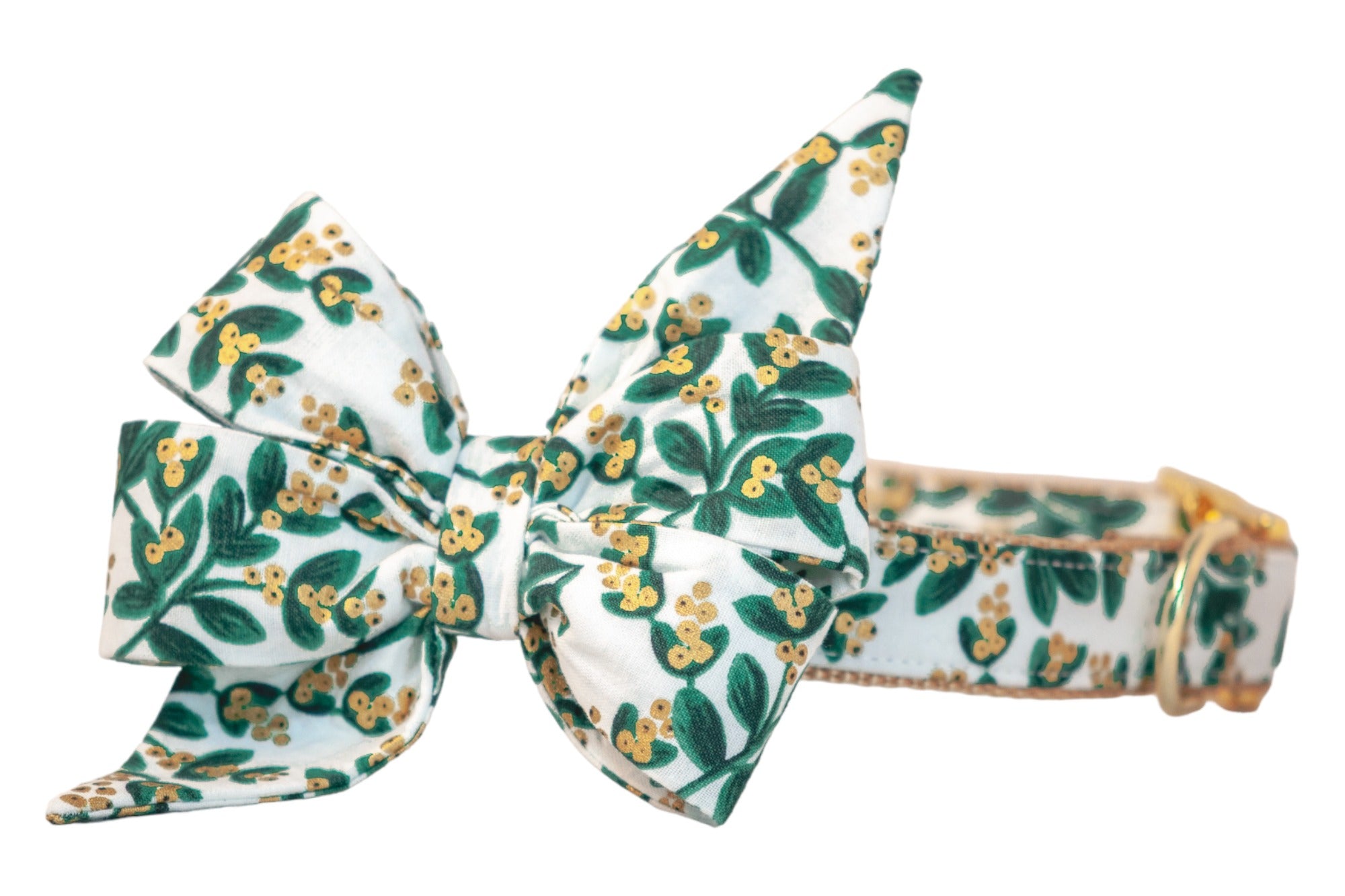 Festive dog collar with an oversized and matching belle bow decorated in a mistletoe pattern of green leaves and shimmering metallic berries, paired with polished hardware for standout seasonal style.