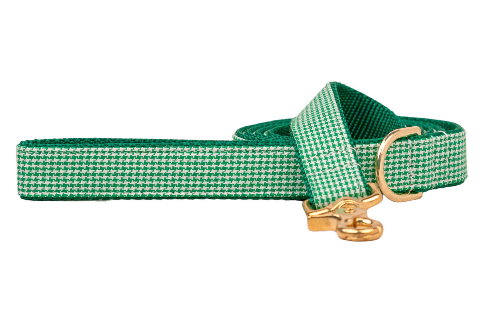 Durable green houndstooth dog leash with a nylon webbing green underside, accented by shiny hardware for a touch of elegance. Includes both a swivel clasp and D-ring for leash accessories