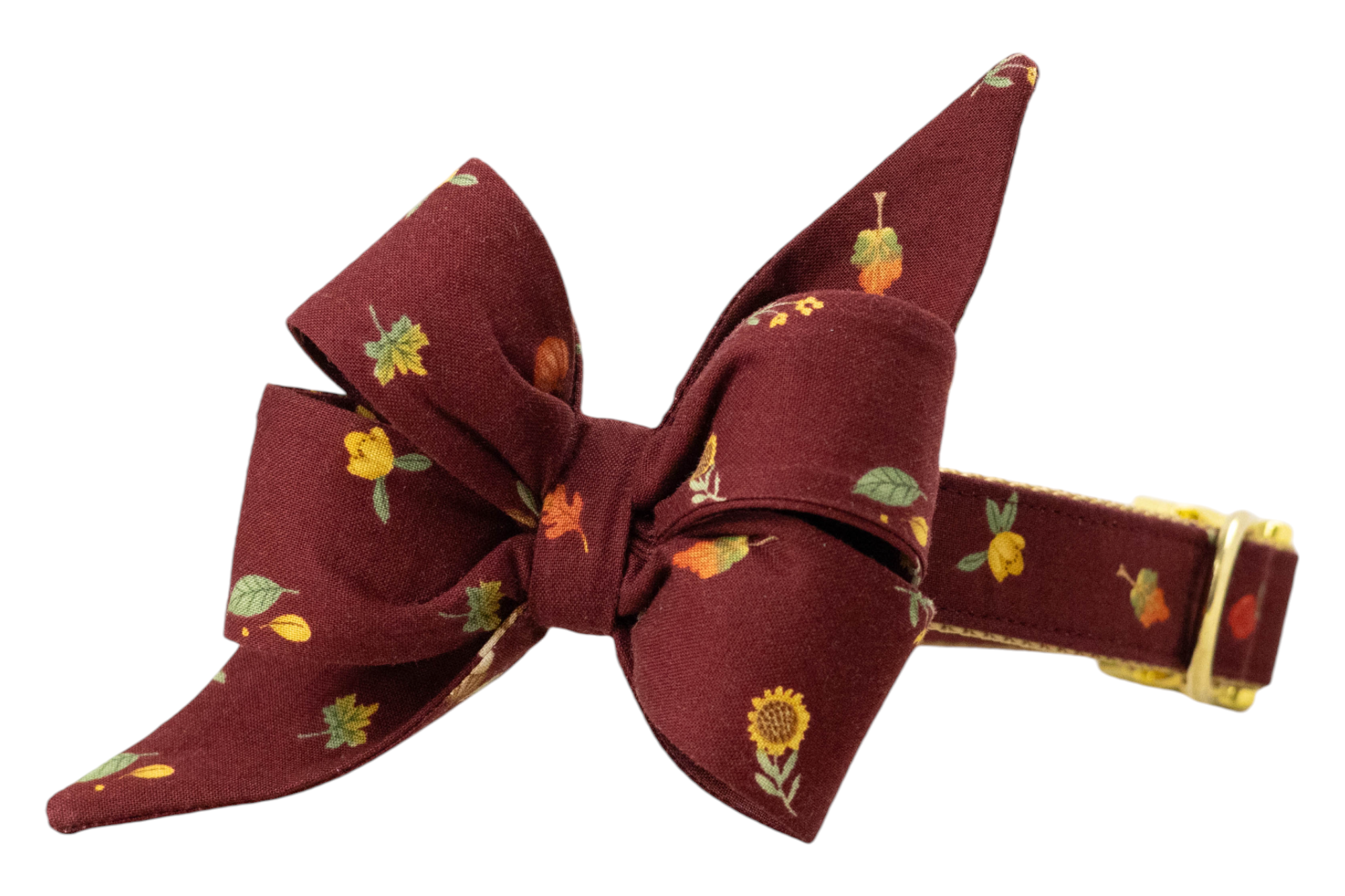 Burgundy dog collar with a matching statement belle bow, adorned with seasonal motifs including maple leaves, sunflowers, and acorns, complemented by metal accents.