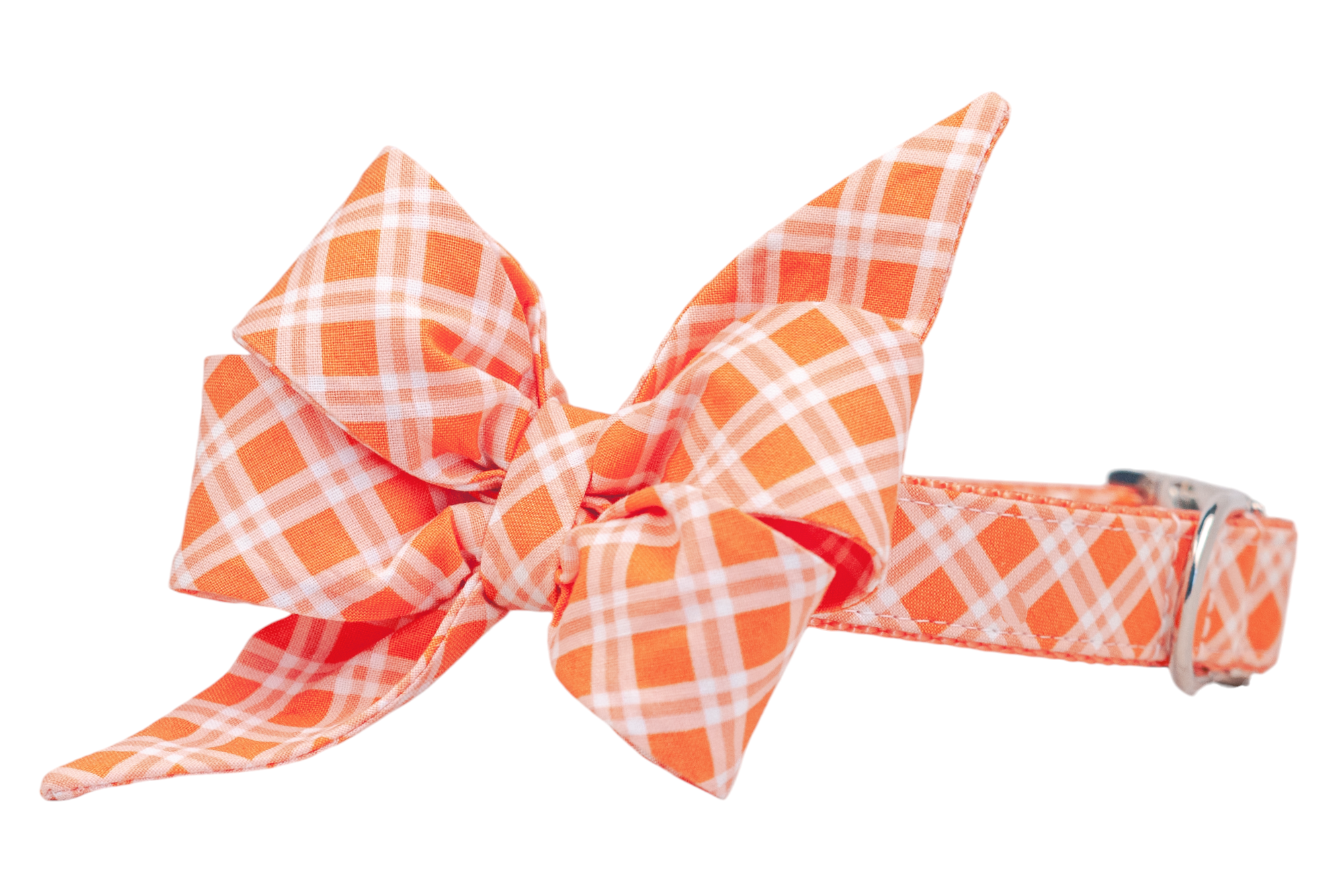 Stylish orange plaid collar for dogs, adorned with an exaggerated, stylish belle bow in coordinating plaid orange and white fabric. It's finished with silver-tone hardware.
