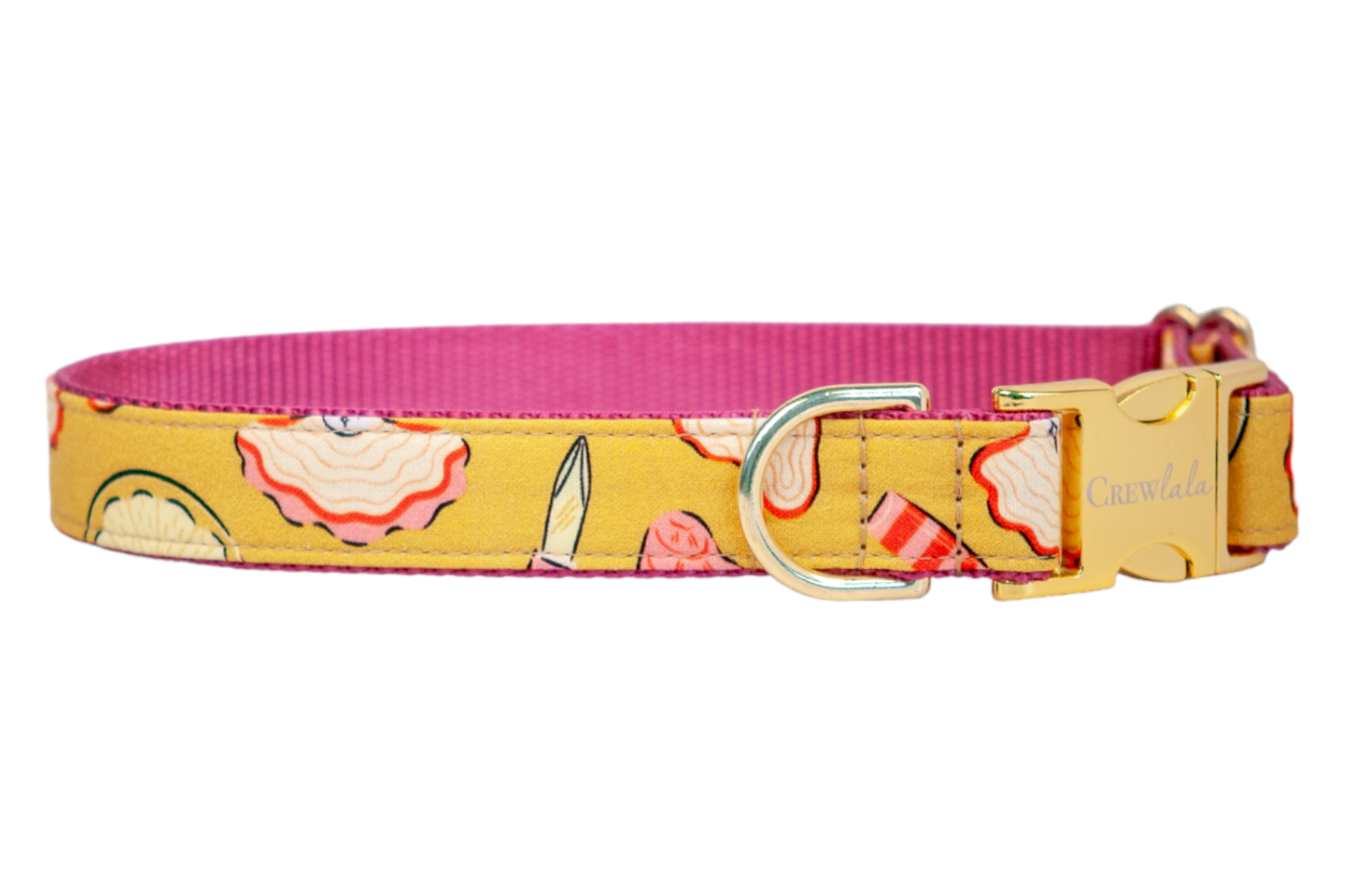 Yellow fabric dog collar with citrus wedges, stylized oysters with wavy pink-edged shells. The collar is lined with vivid pink webbing and fitted with gold-tone hardware, including a secure side-release buckle and D-ring.
