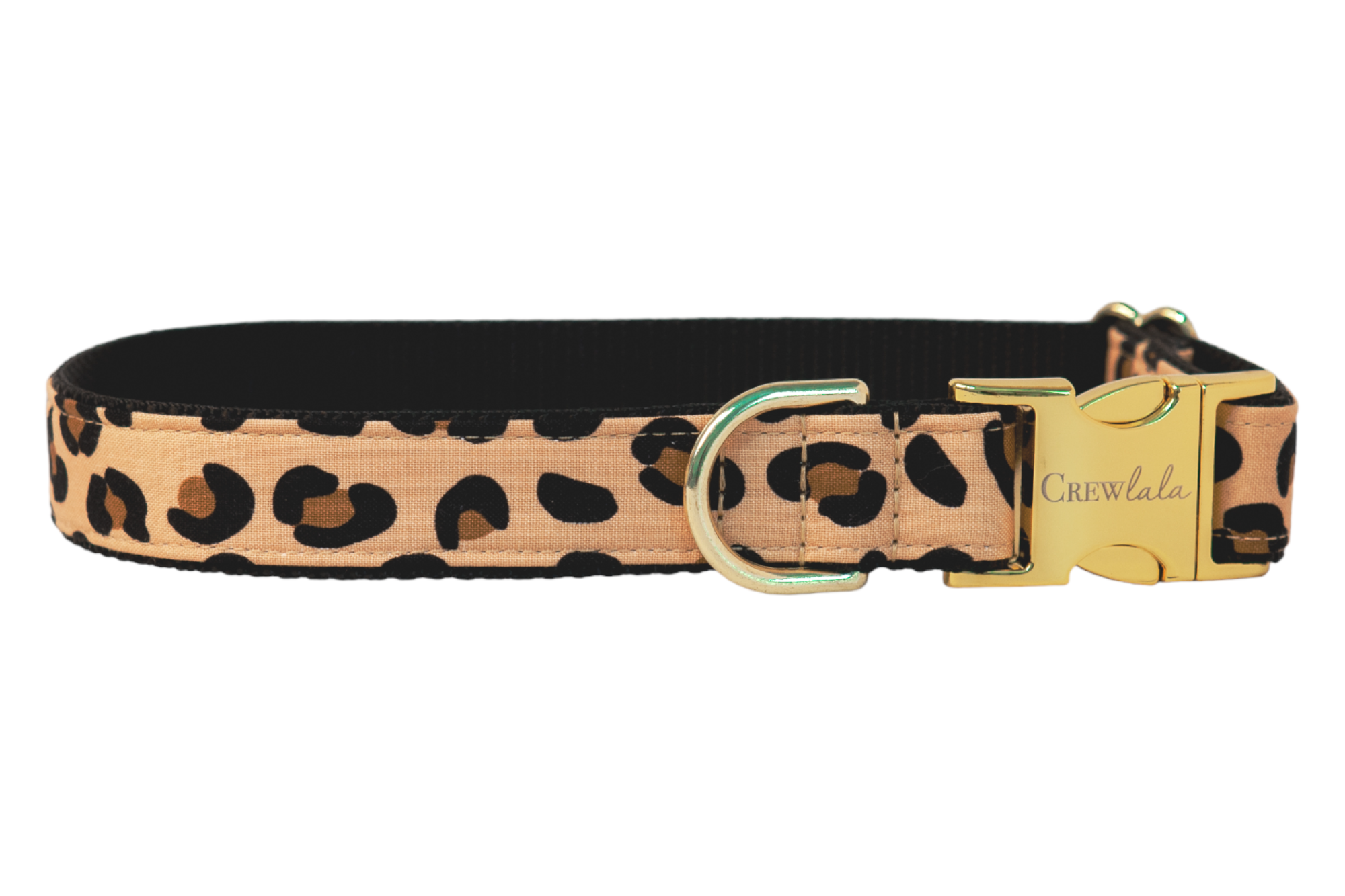 Stylish dog collar featuring a tan fabric with bold leopard spots, metal hardware, and a sleek nylon webbing backing—perfect for pups with glam instincts and wild hearts.