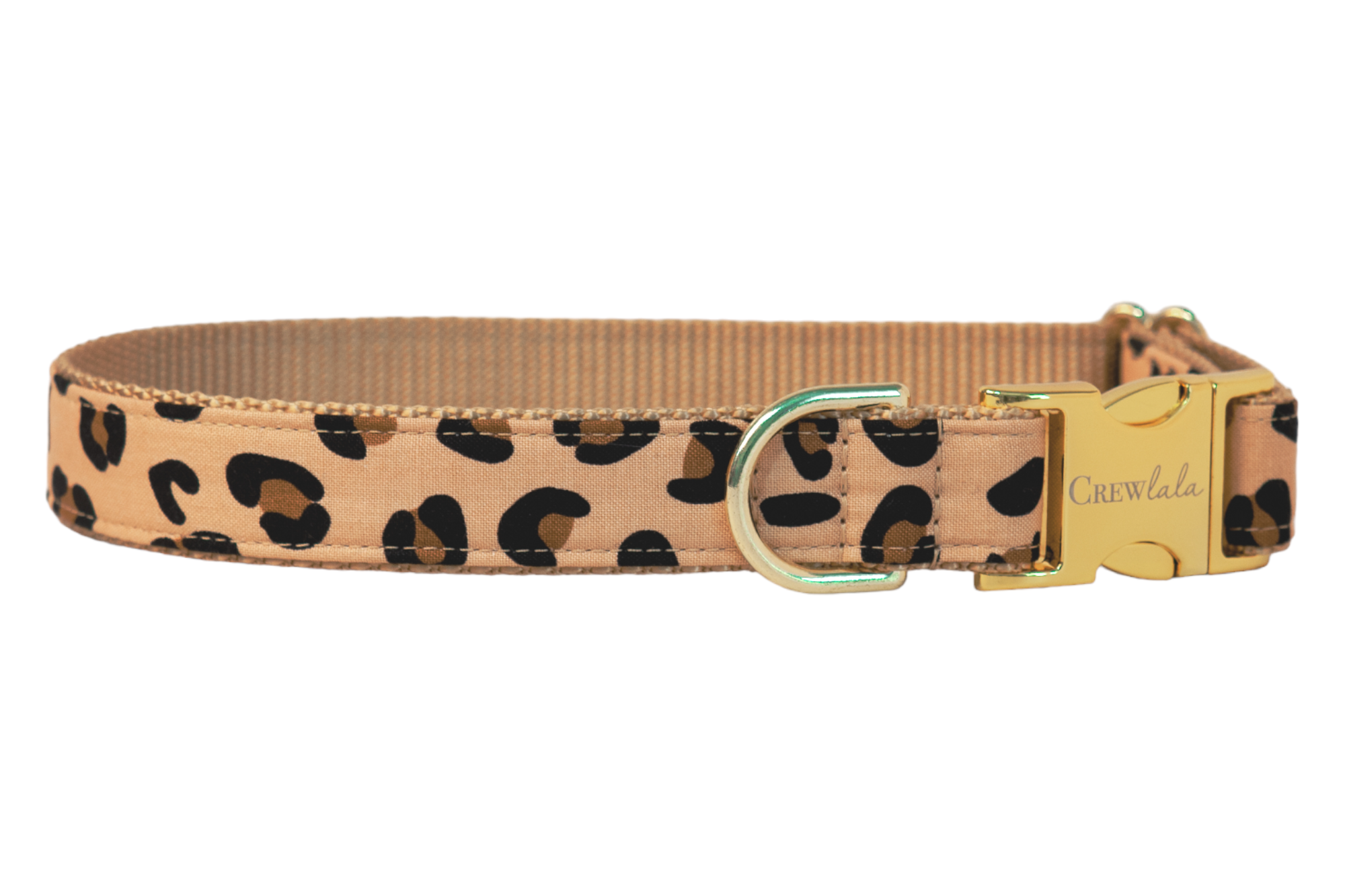 Stylish dog collar featuring a tan fabric with bold leopard spots, metal hardware, and a sleek tan nylon webbing backing—perfect for pups with glam instincts and wild hearts.
