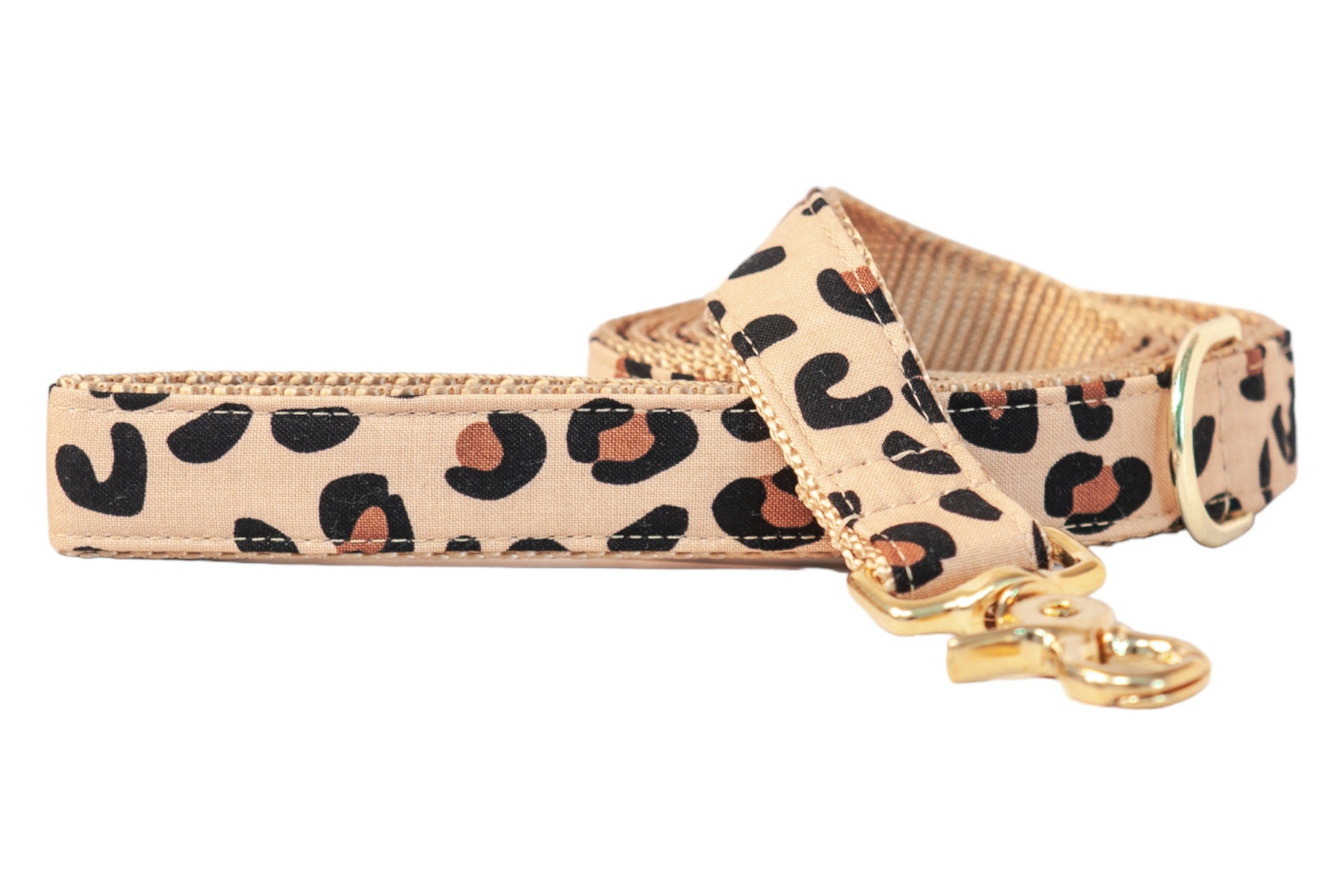 Unleash your pup’s wild side with this leopard-print dog leash, featuring durable stitching and fierce fashion flair.