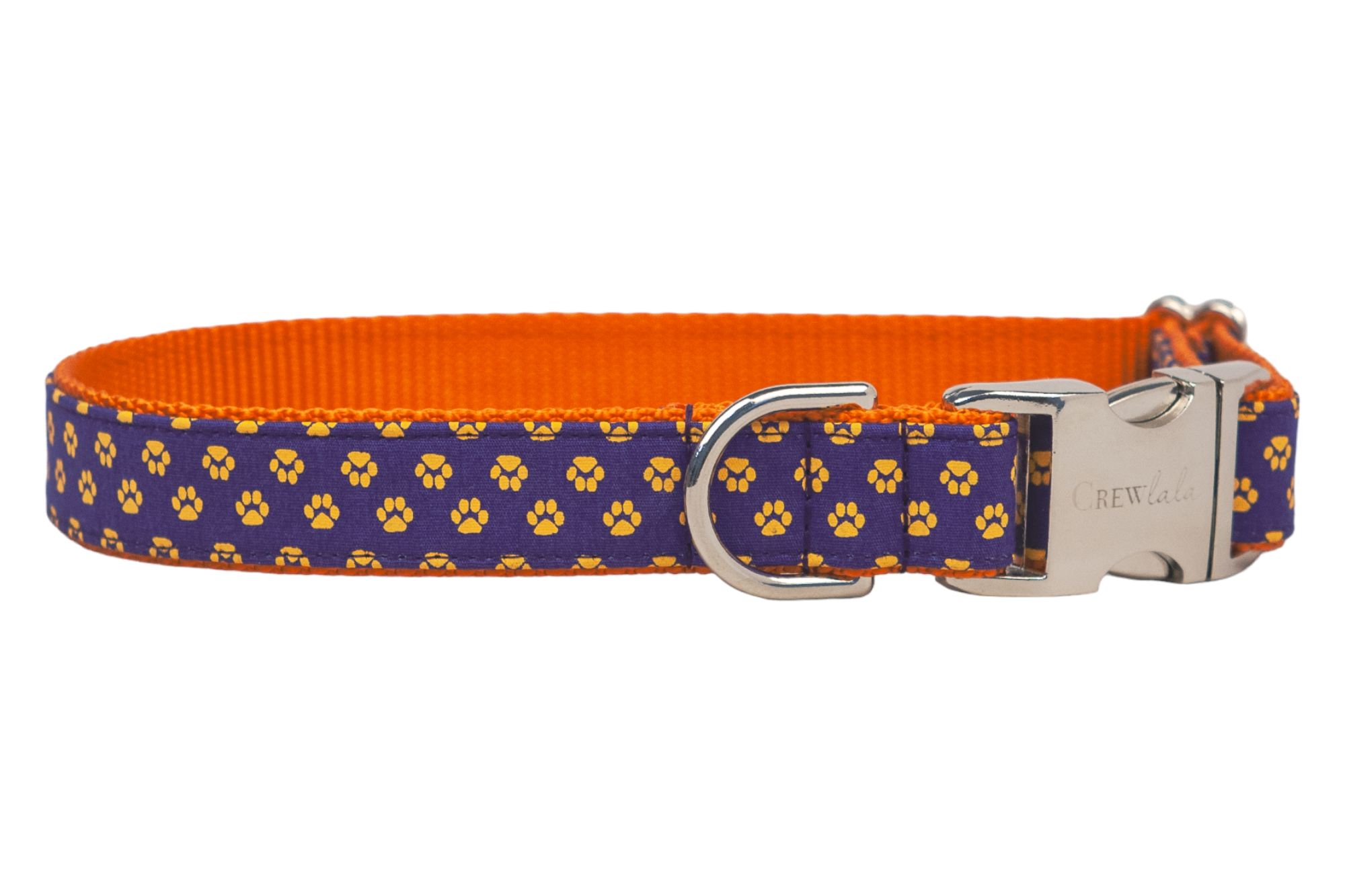 A bold and playful dog collar designed with paw prints on deep navy and lined with bright nylon webbing. Complete with a polished buckle and D-ring for durability and flair.