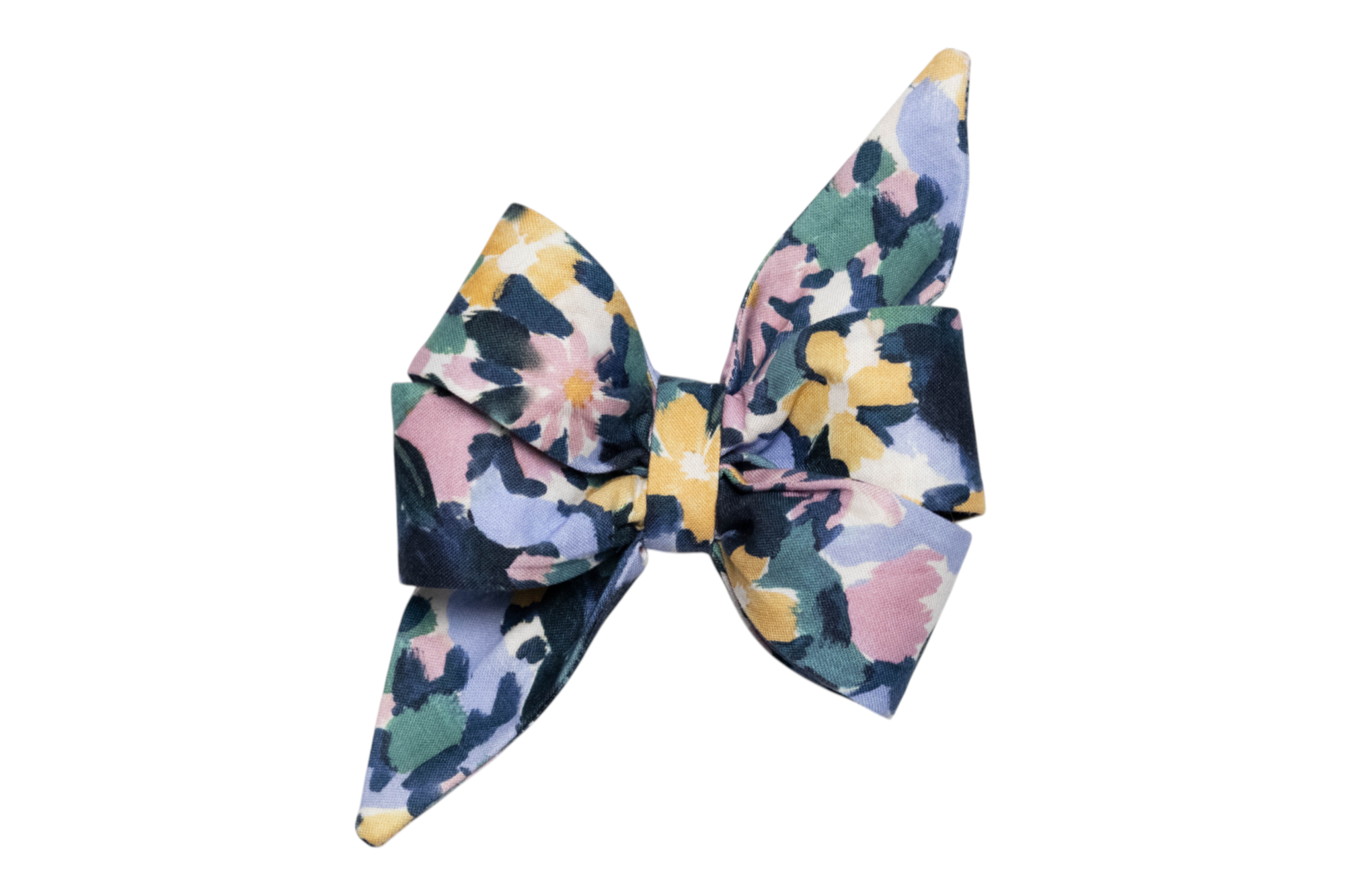 An oversized dog belle bow in a pastel feminine floral print. The belle bow features long, pointed tails and layered loops in a symmetrical design.