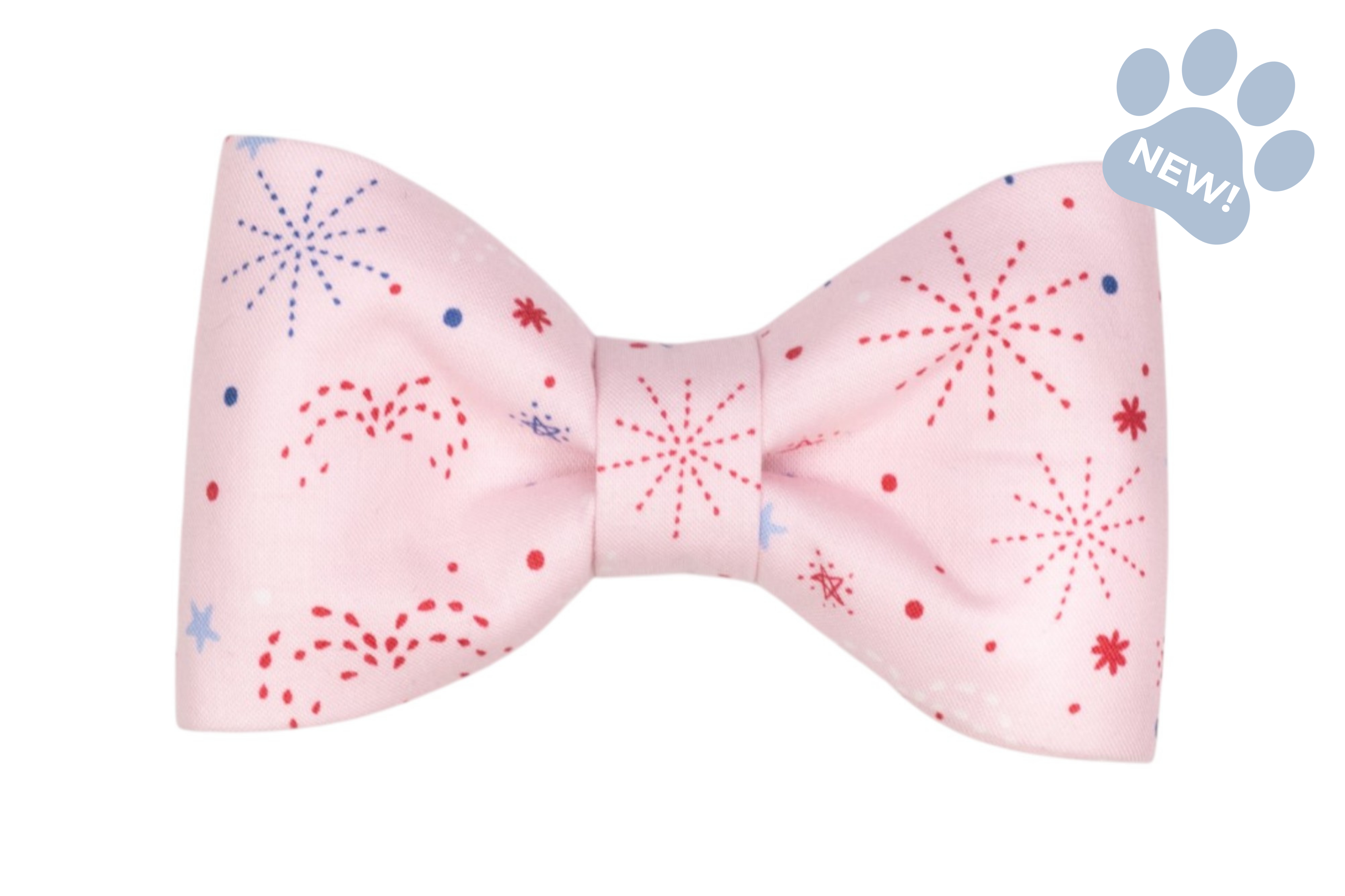 Soft pink bow tie with red and blue firework bursts and dotted accents, displayed on a clean white background.