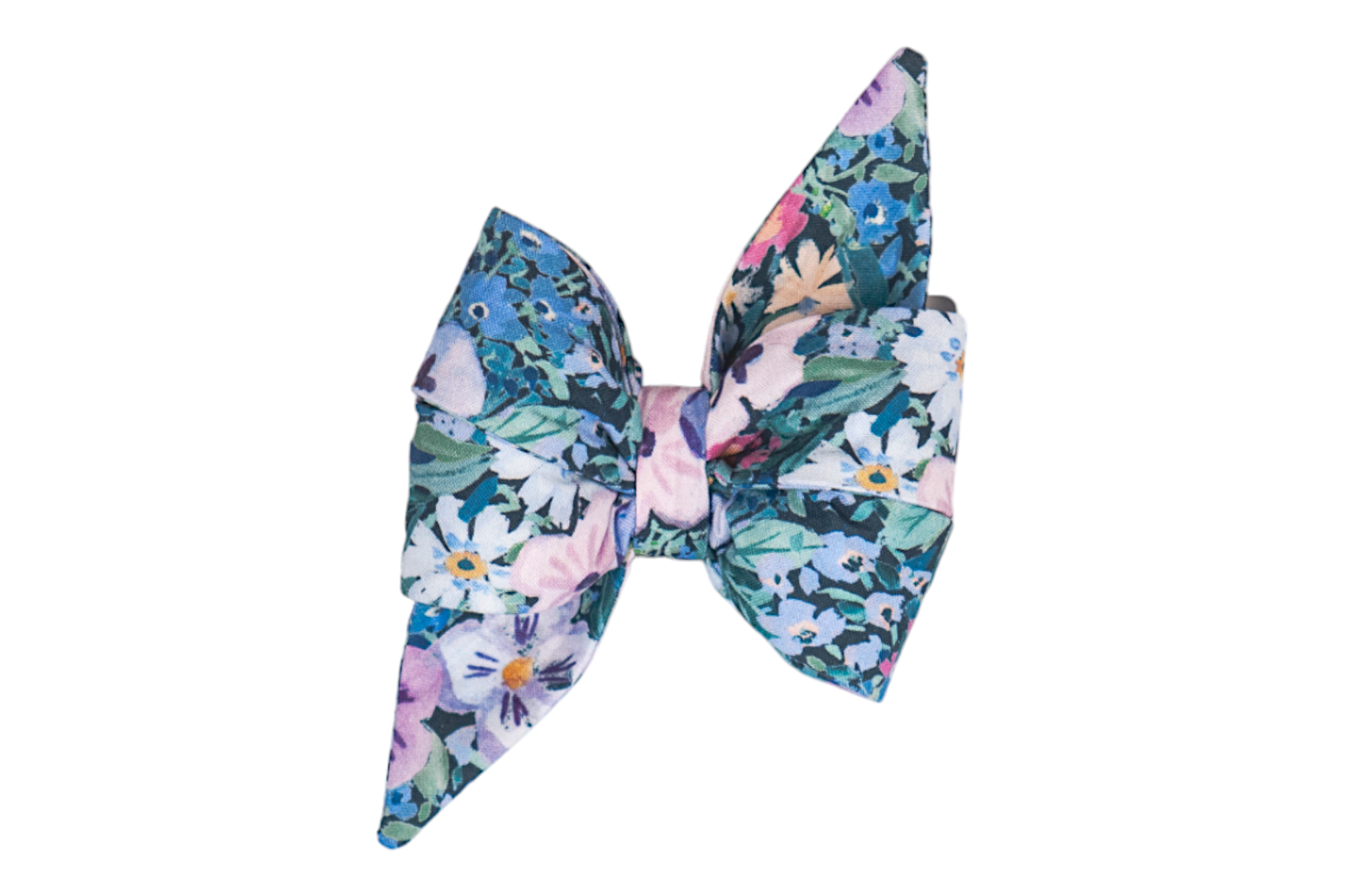 Floral dog belle bow with a painterly print of flowers on a dark leafy background. The bow tie is tied with wide pleats and dramatic pointed ends.