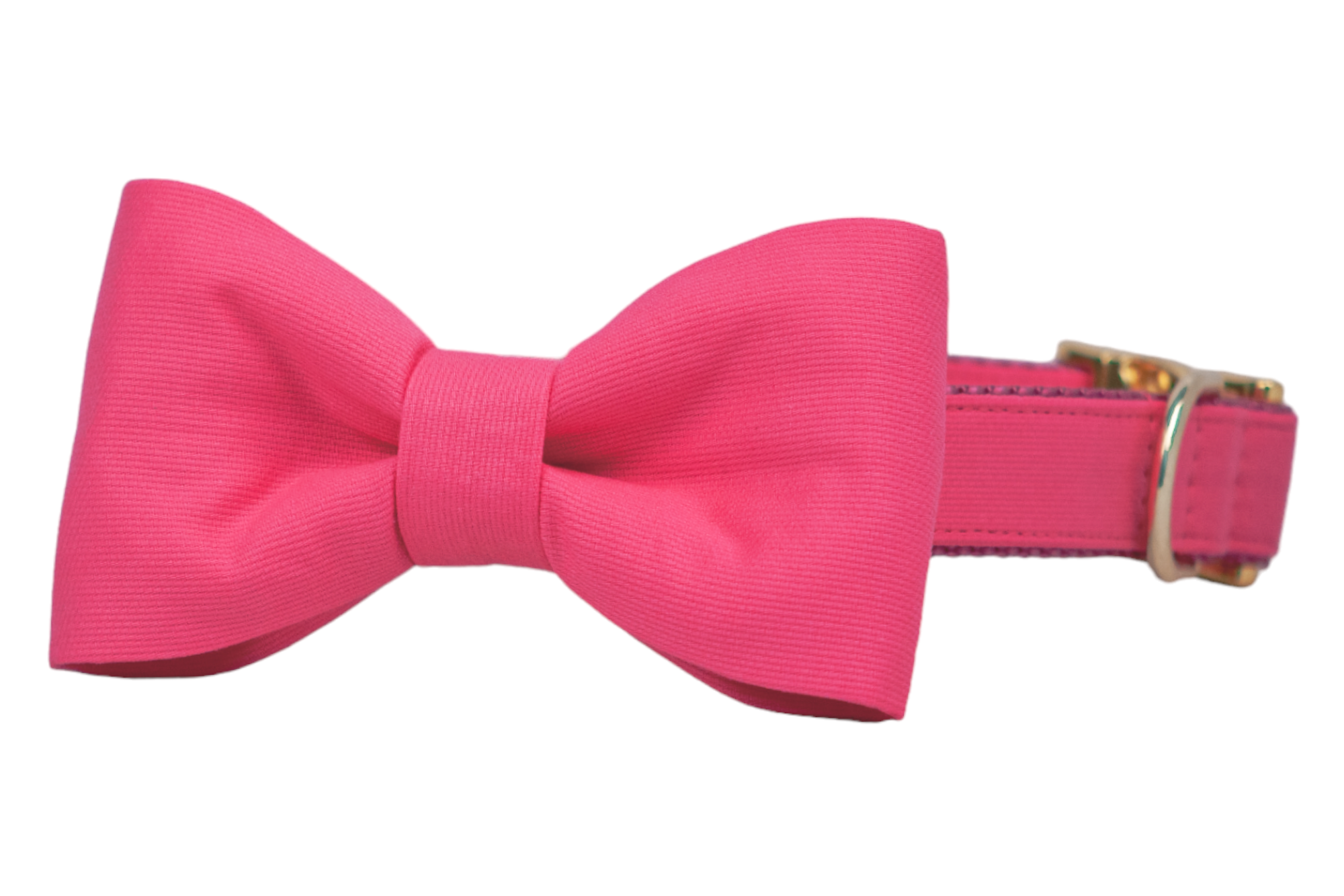 Chic dog collar in bold pink with a matching bow tie, crafted from textured fabric and detailed with gold-tone accents—ideal for stylish pets on special occasions or everyday charm.