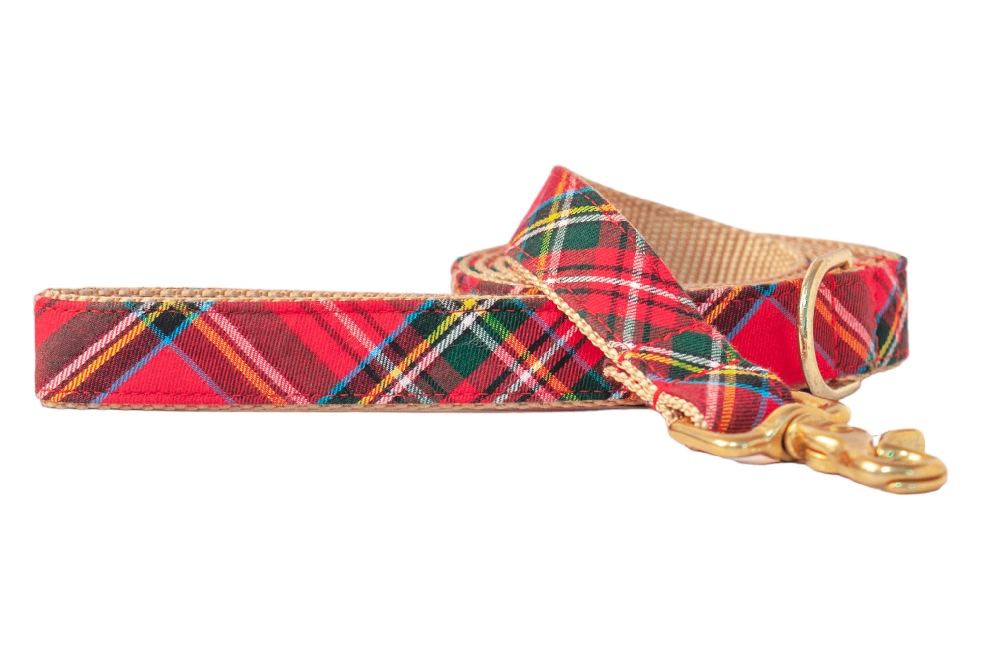 Classic Christmas dog leash in bright red multicolor plaid with traditional striping, finished with neutral lining and a gleaming polished clasp for timeless seasonal charm.