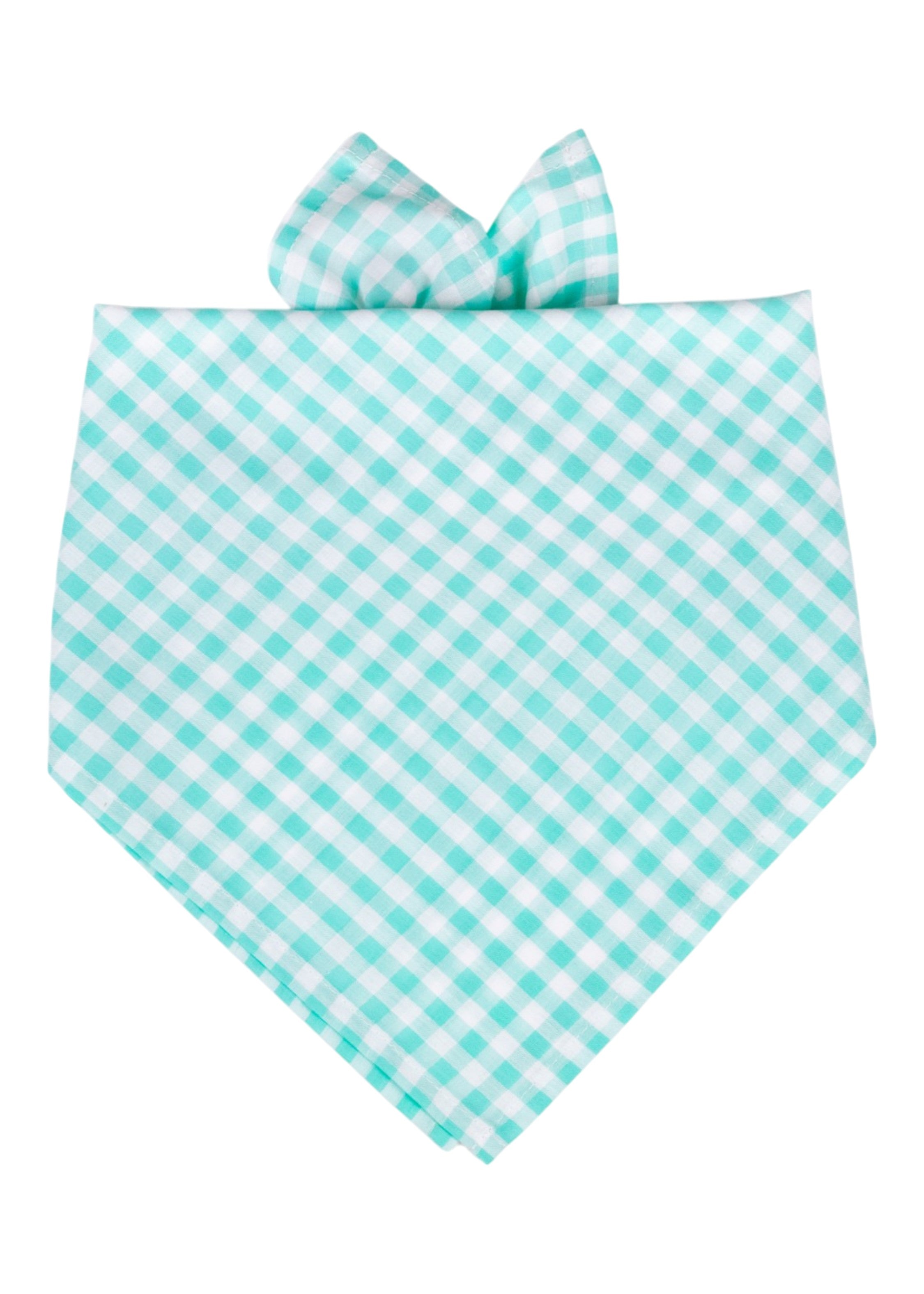 Seafoam green and white picnic plaid dog bandana featuring a classic checkered pattern and a tie-on design. Displayed flat against a light gray background, with a coordinating bow peeking over the top edge.