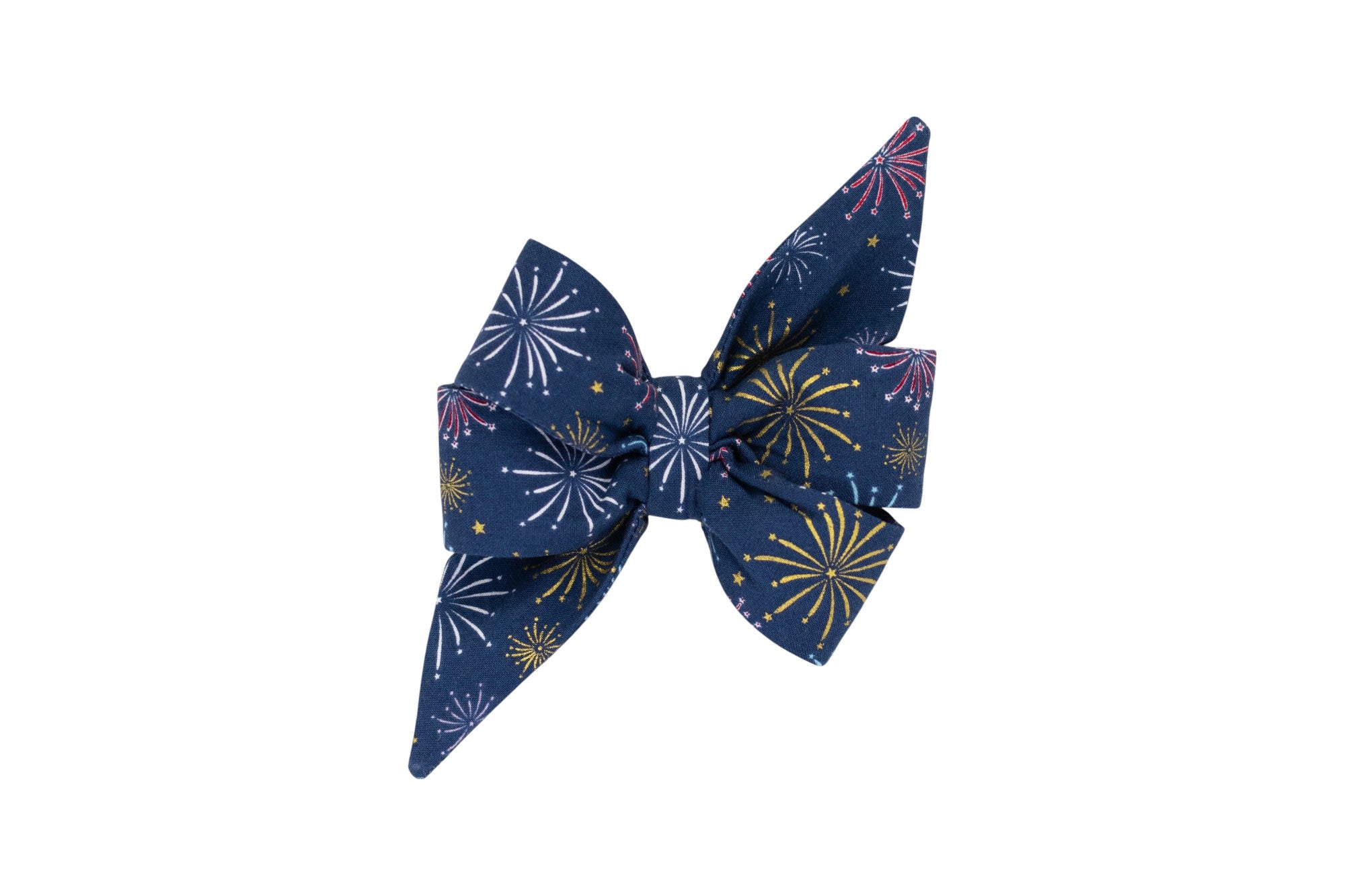 Festive girl dog belle bow featuring colorful fireworks and star patterns on a dark blue fabric—perfect for holidays like July 4th or any patriotic celebration.