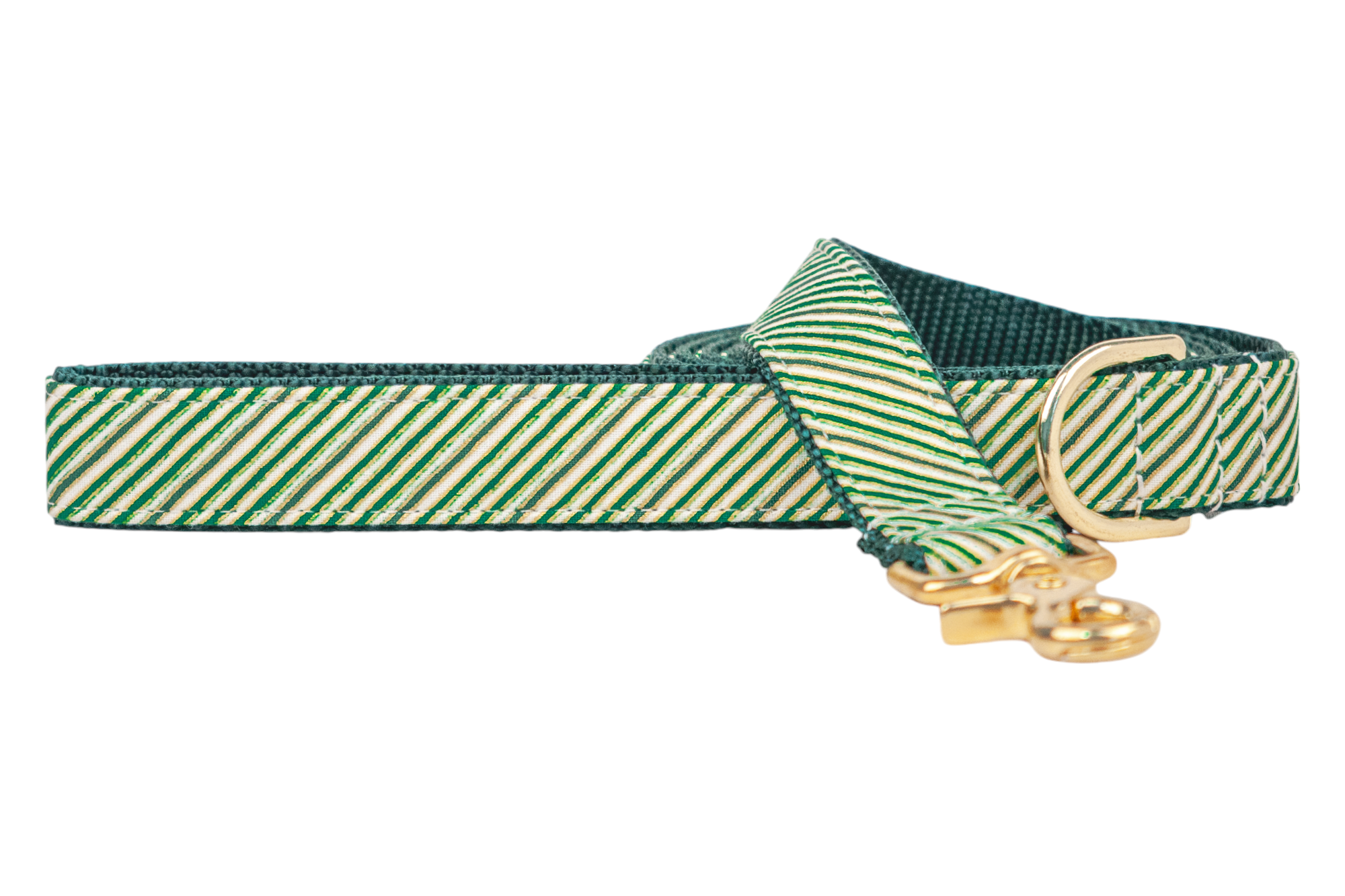 A festive dog leash with a diagonal green striped pattern, reminiscent of holiday peppermint sticks. The leash is lined with dark green webbing for added durability and finished with polished hardware, including a swivel clasp and D-ring near the handle.