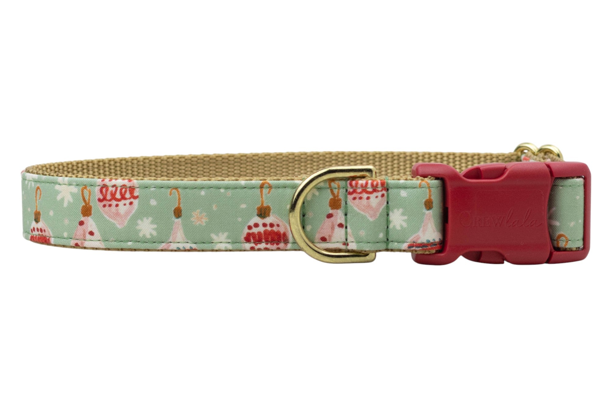 A festive dog collar with a pale green fabric exterior featuring Christmas ornaments, hooks, and snowflakes. The inner lining is durable nylon webbing. The collar includes sturdy hardware: a D-ring, adjustable sizing slider, and a side-release buckle engraved with the brand name “Crewlala.”