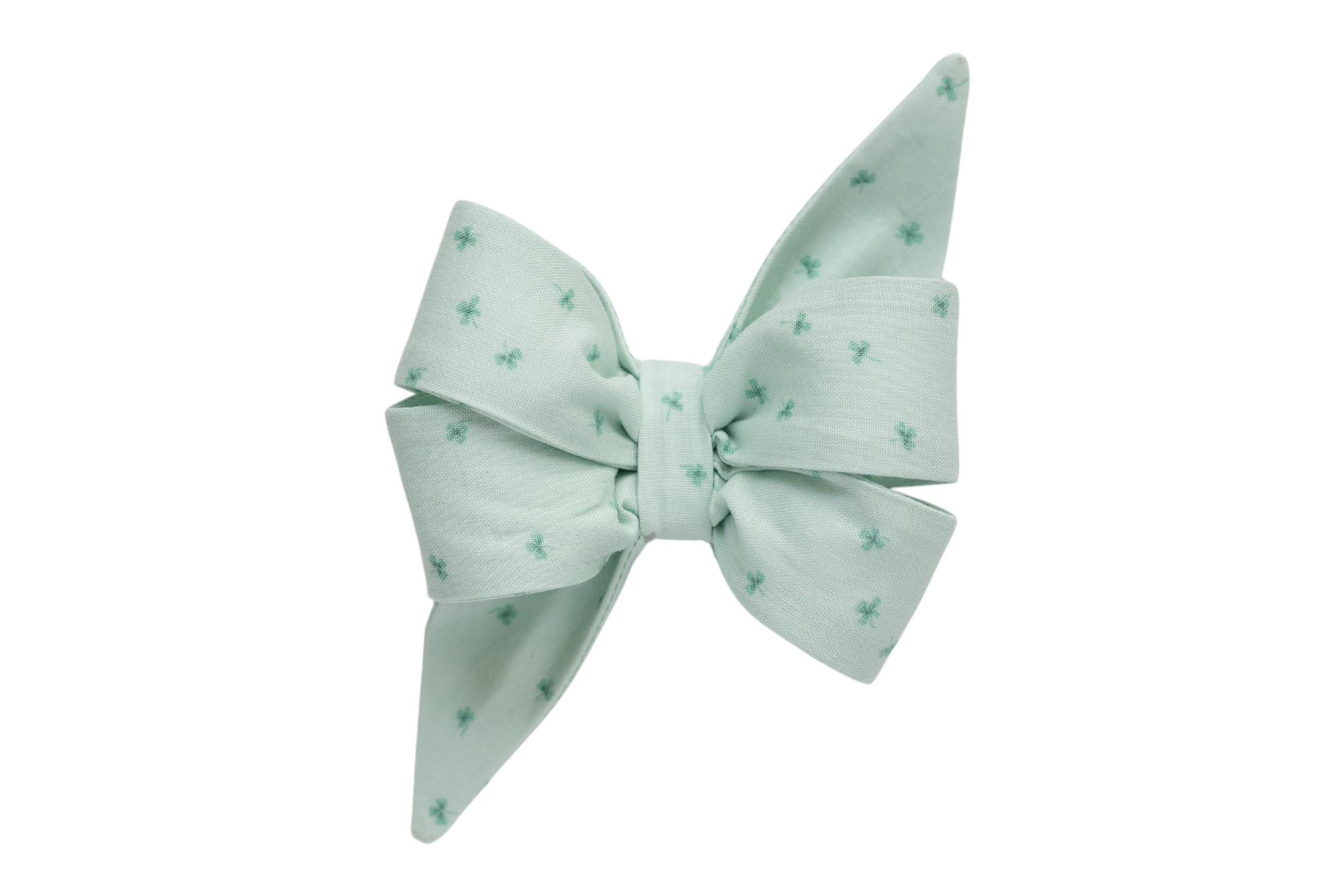 Beautifully crafted mint-green girl dog belle bow with a subtle clover print, perfect for St. Patrick's Day.