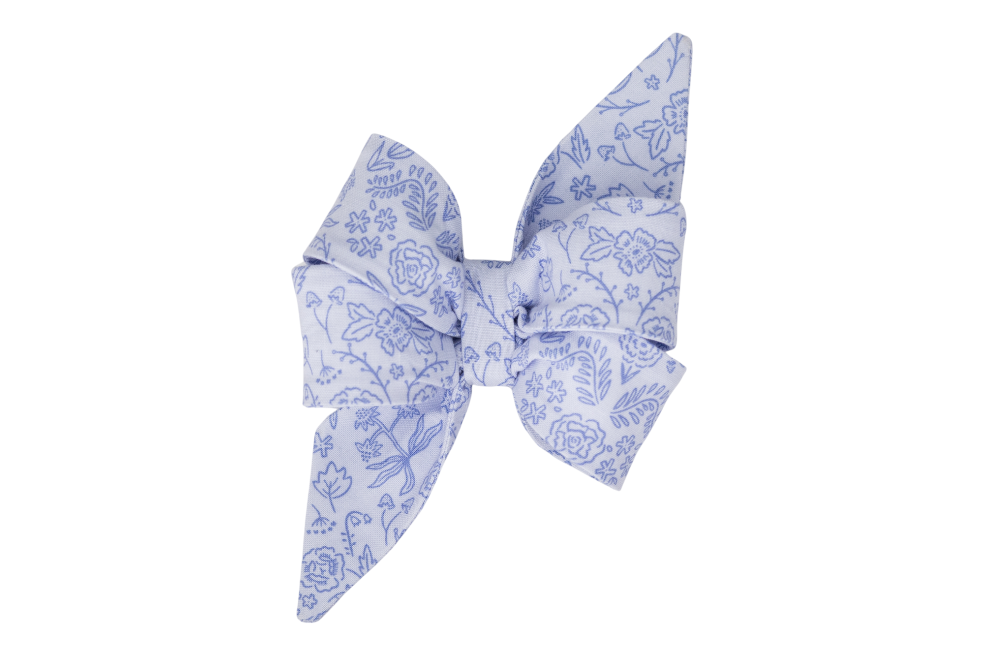 A girl dog belle bow with a soft light blue background featuring a delicate floral pattern in darker blue. The bow has a symmetrical, classic shape, designed for pets to wear as an accessory.