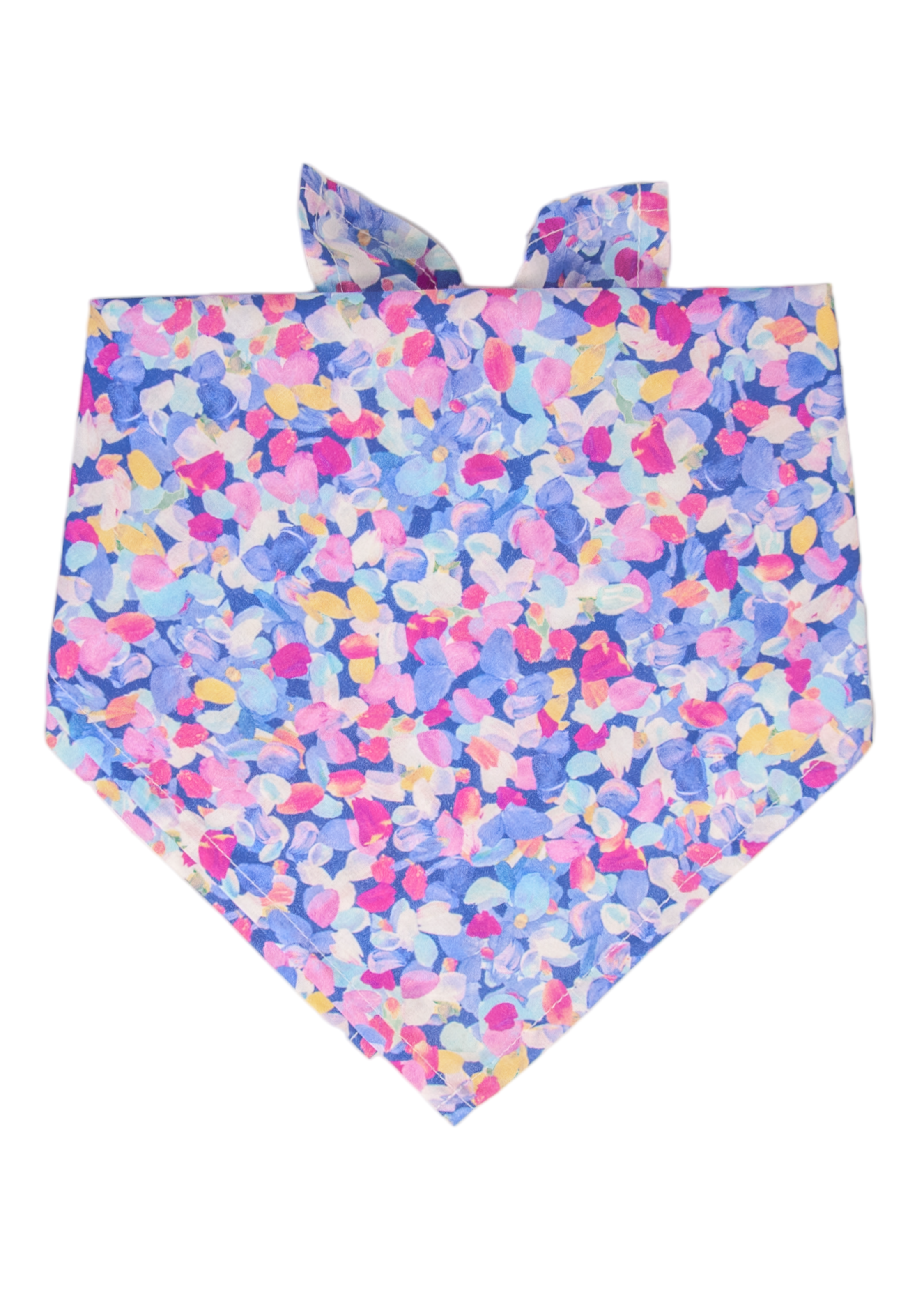 Brightly colored dog bandana in a tie-on style, printed with a dense floral design composed of abstract petals in fuchsia, lavender, sky blue, soft yellow, and white. The bandana is neatly folded and tied corners at the top, suitable for stylish pets.