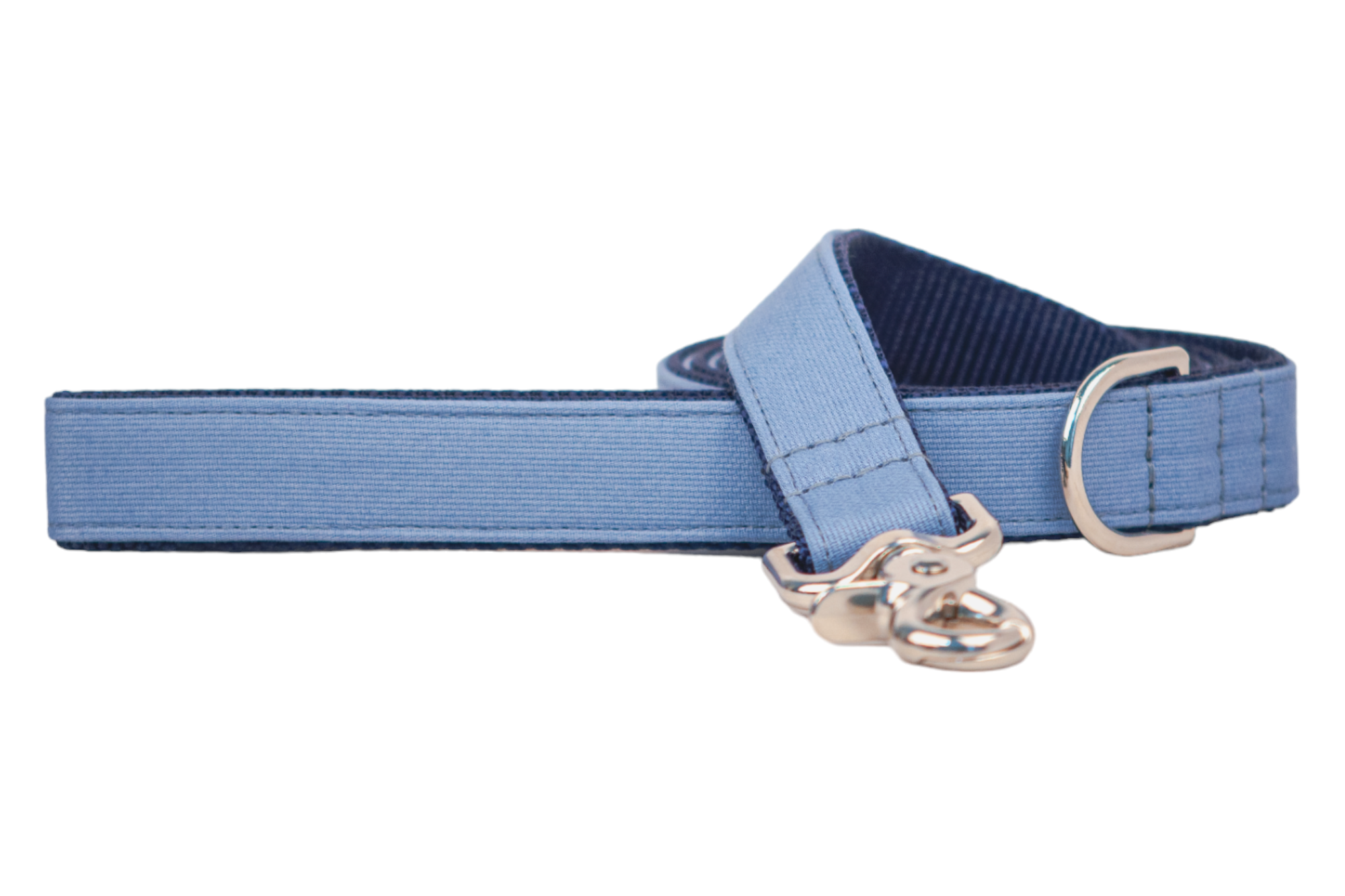 A stylish dog leash in slate blue with a grosgrain-textured fabric exterior and a dark navy webbing underside. The leash features reinforced stitching, a shiny silver metal clasp, and a D-ring near the handle for attaching accessories or waste bags.