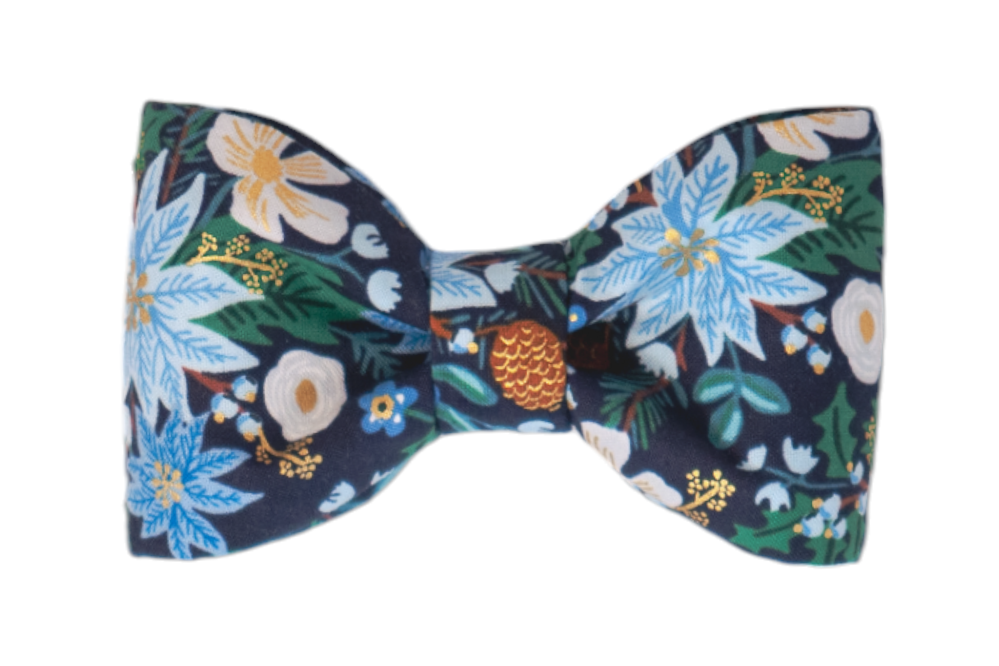 A holiday-themed fabric dog bow tie featuring a navy blue background with a winter floral print. The design includes light blue poinsettia-like flowers, blossoms, pinecones, fir branches, and accents of metallic detailing throughout the pattern.