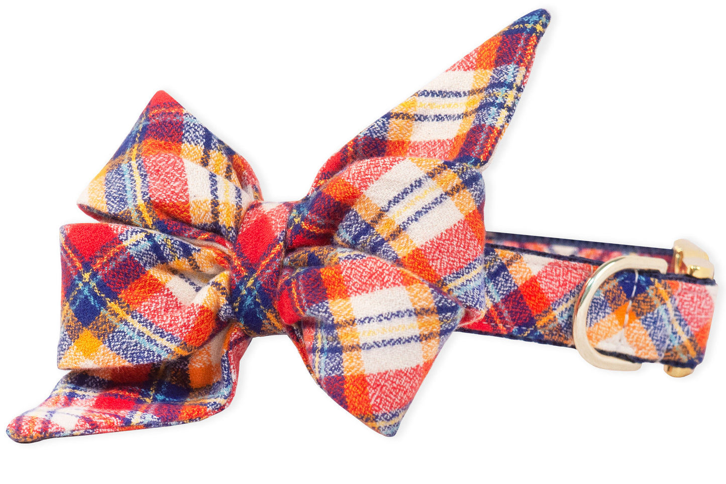 Dog collar featuring a matching, large double-layered belle bow in a bold plaid pattern perfect for a fall stroll. The pointed, feminine belle bow tips are exaggerated for a dramatic look, and the collar has a metal buckle and D-ring for leash attachment.